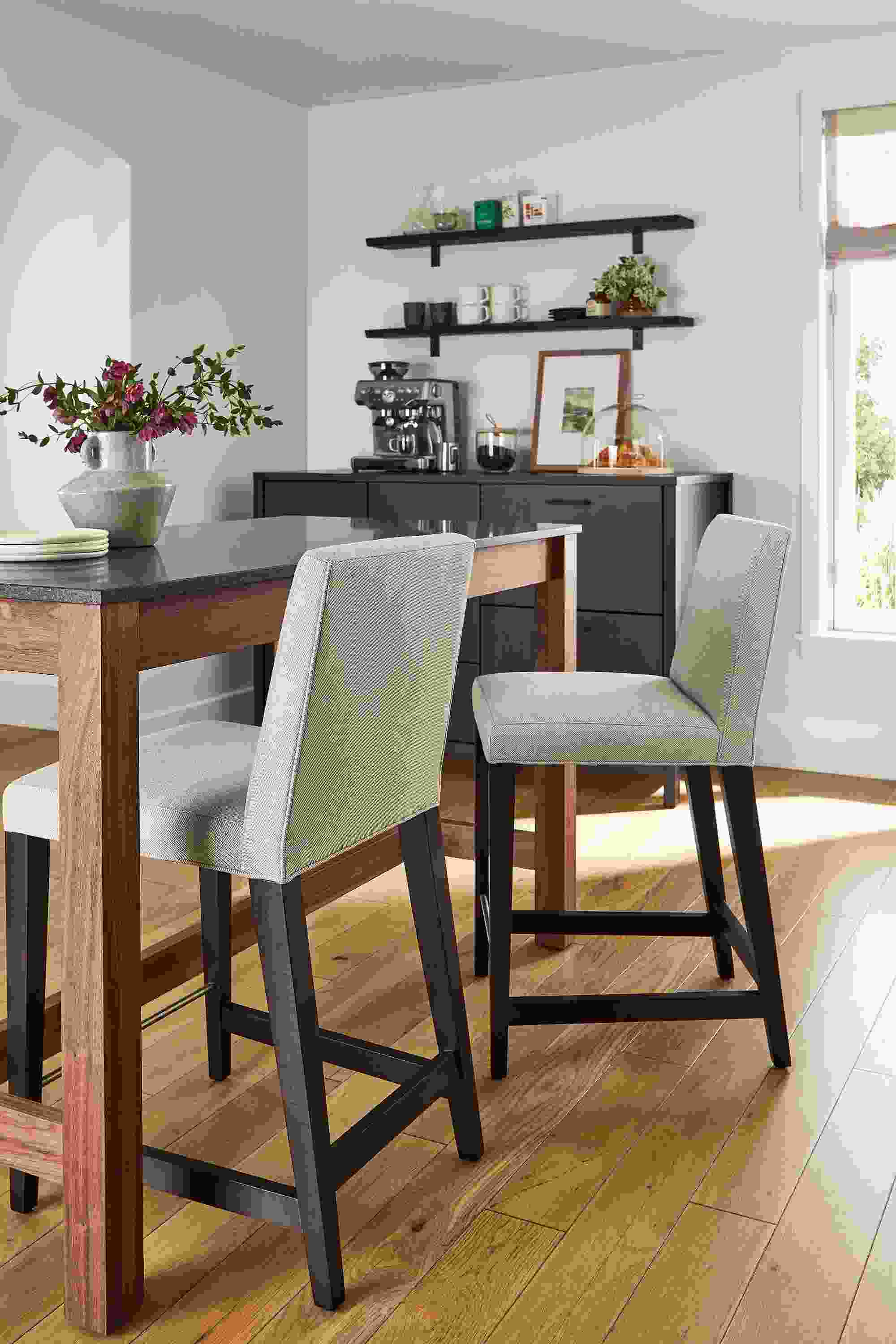 dining area with ava counter stools, linden counter table and emerson fridge cabinet.