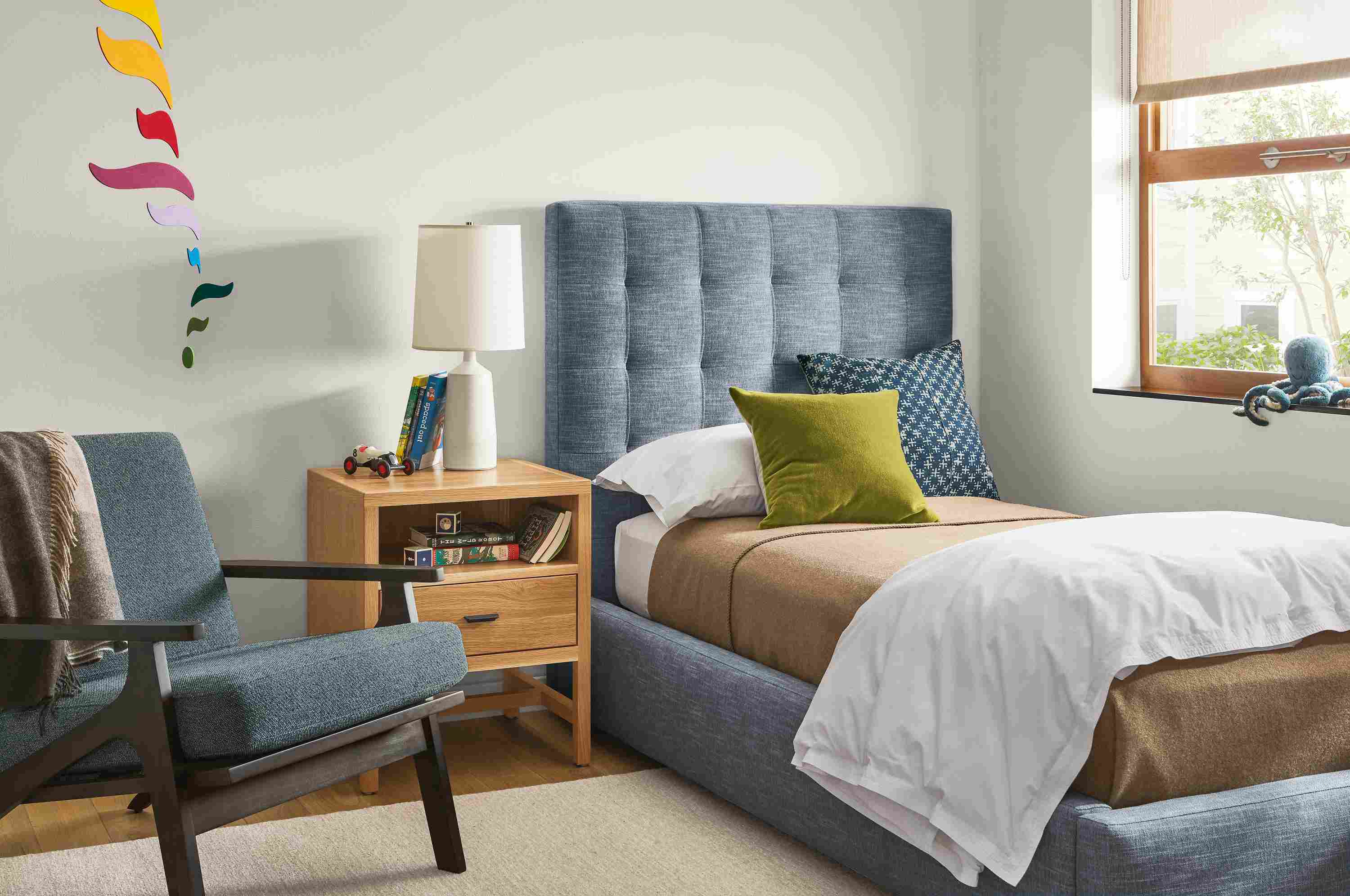 Detail of Avery twin storage bed in Destin Royal fabric in kids bedroom.