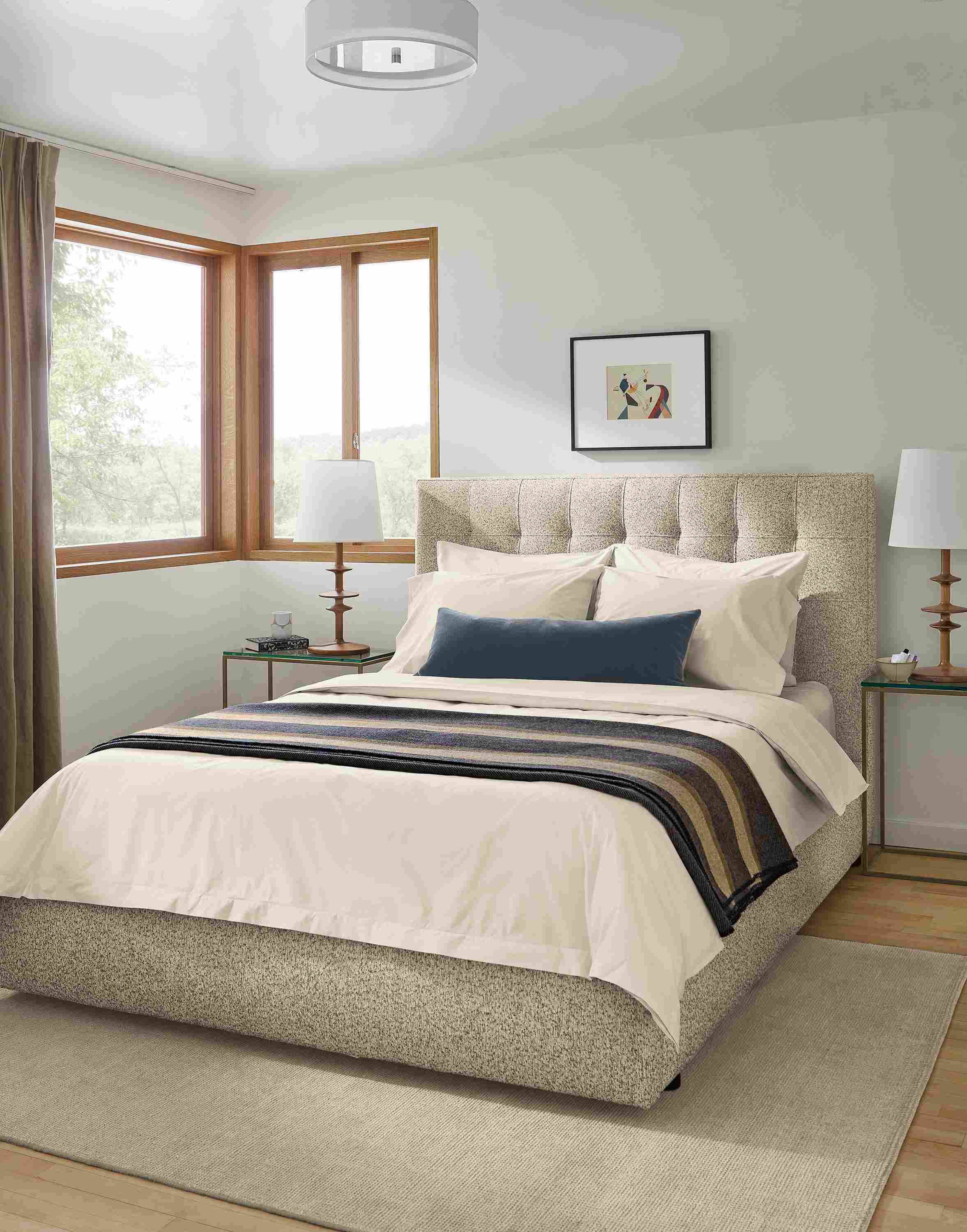 Bedroom with Avery storage bed in Conley oatmeal fabric  and Samar 6 x 9 rug in silver.