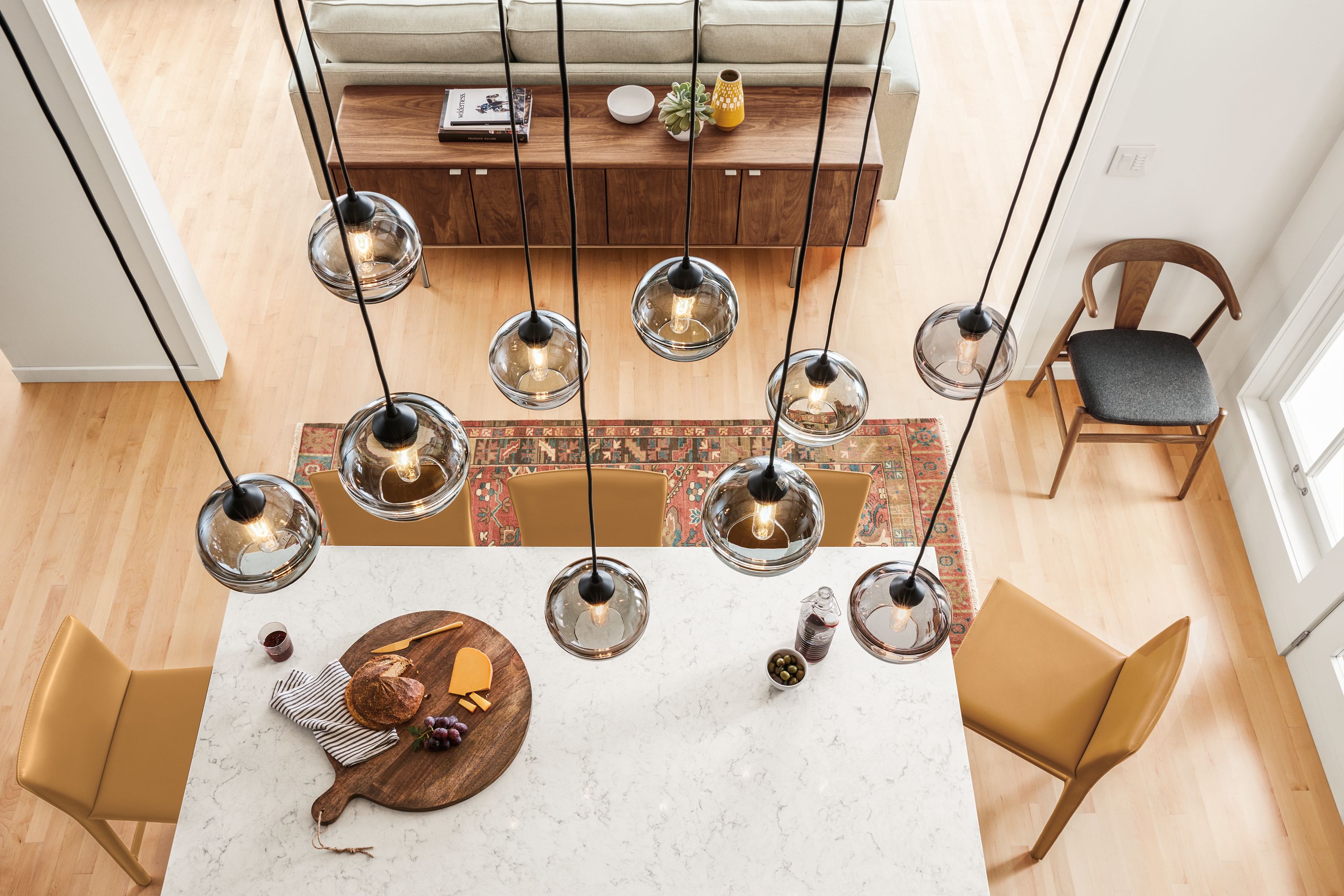 2 sets of five globe pendants in smoke