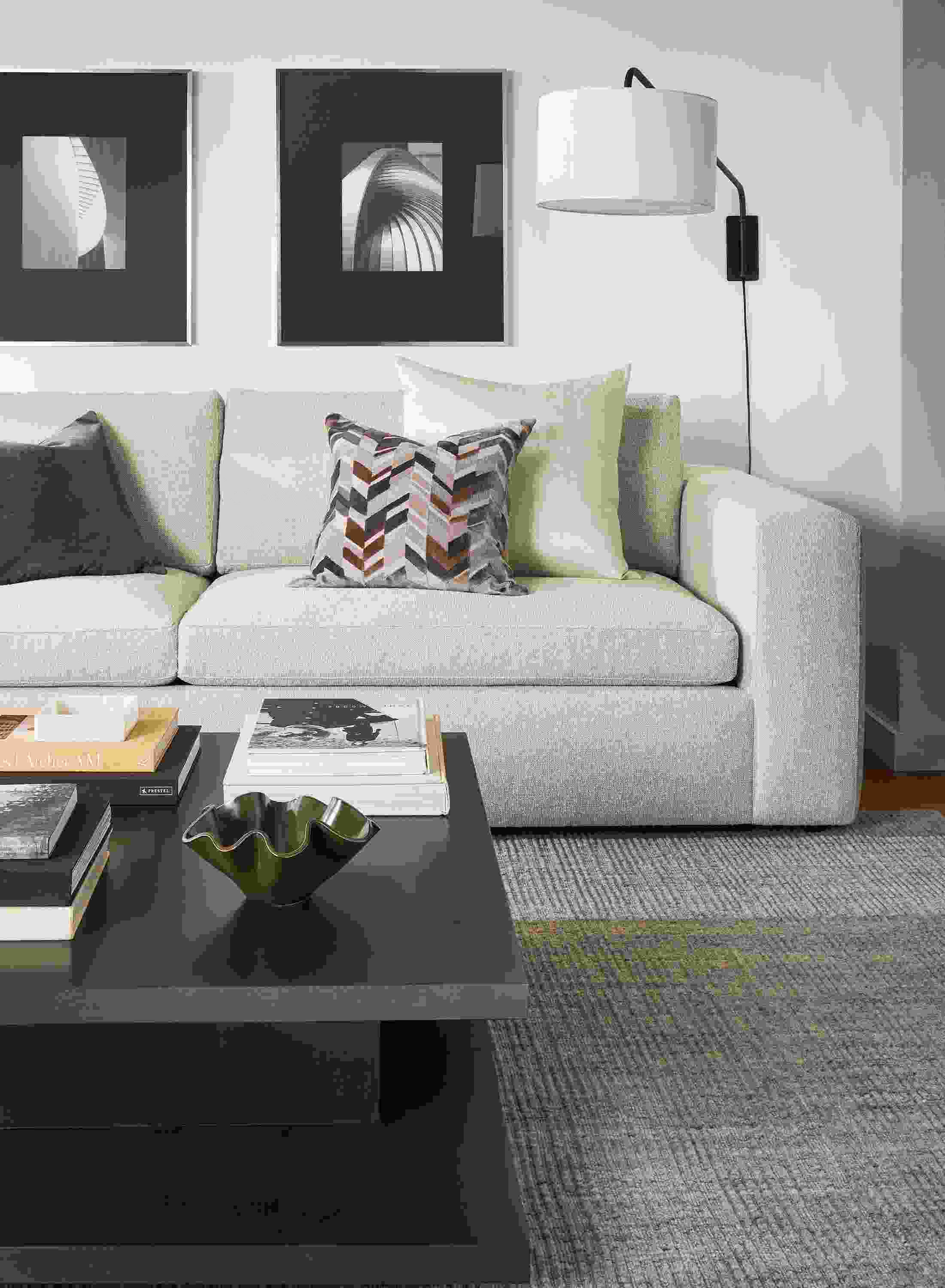 Living room with baylor sofa in conley natural and graham 42 by 42 coffee table in charcoal.