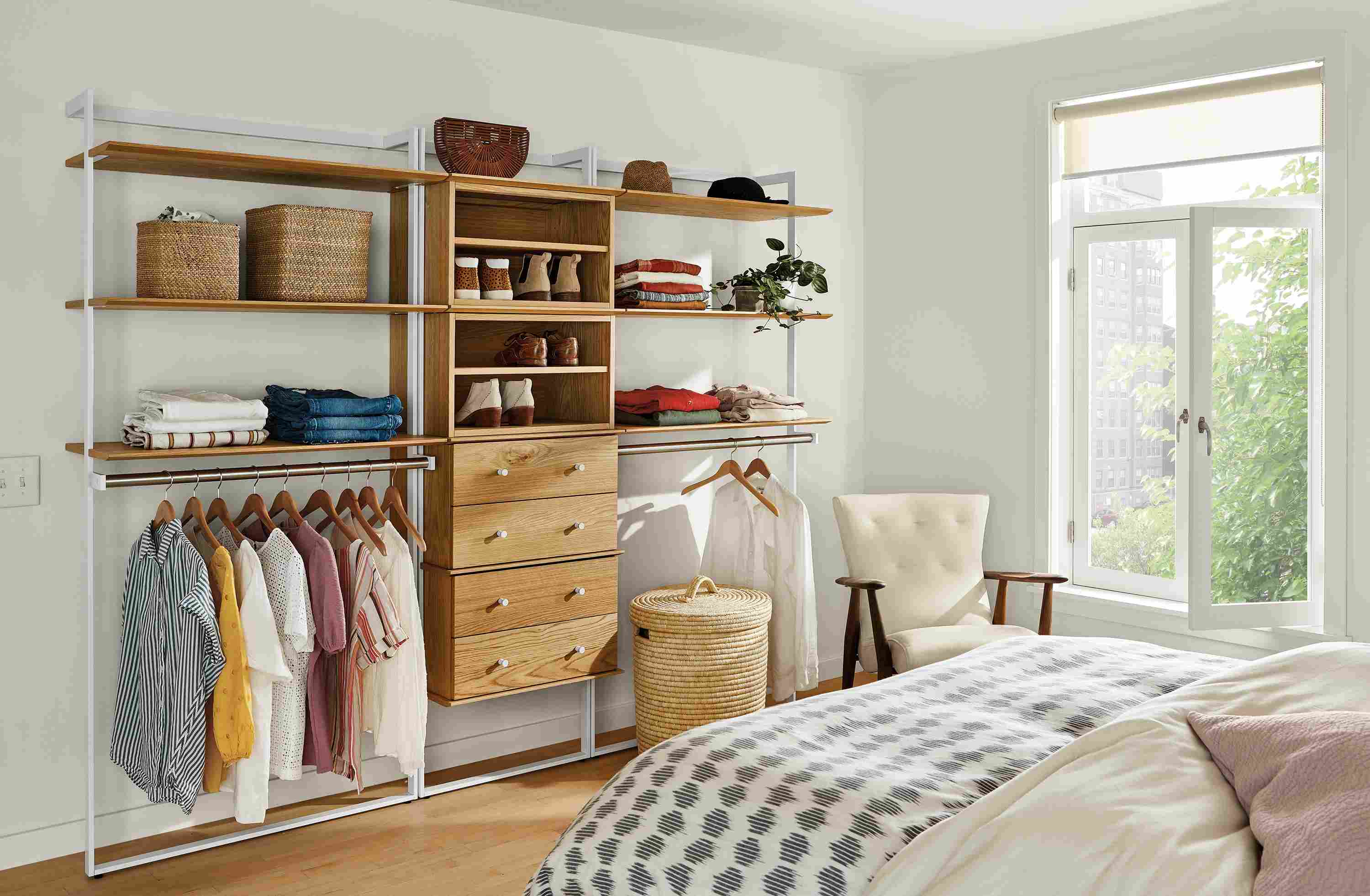 Bedroom with Beam 96-wide by 78-high Clothing Wall Unit in white with white oak Inserts and white hardware.