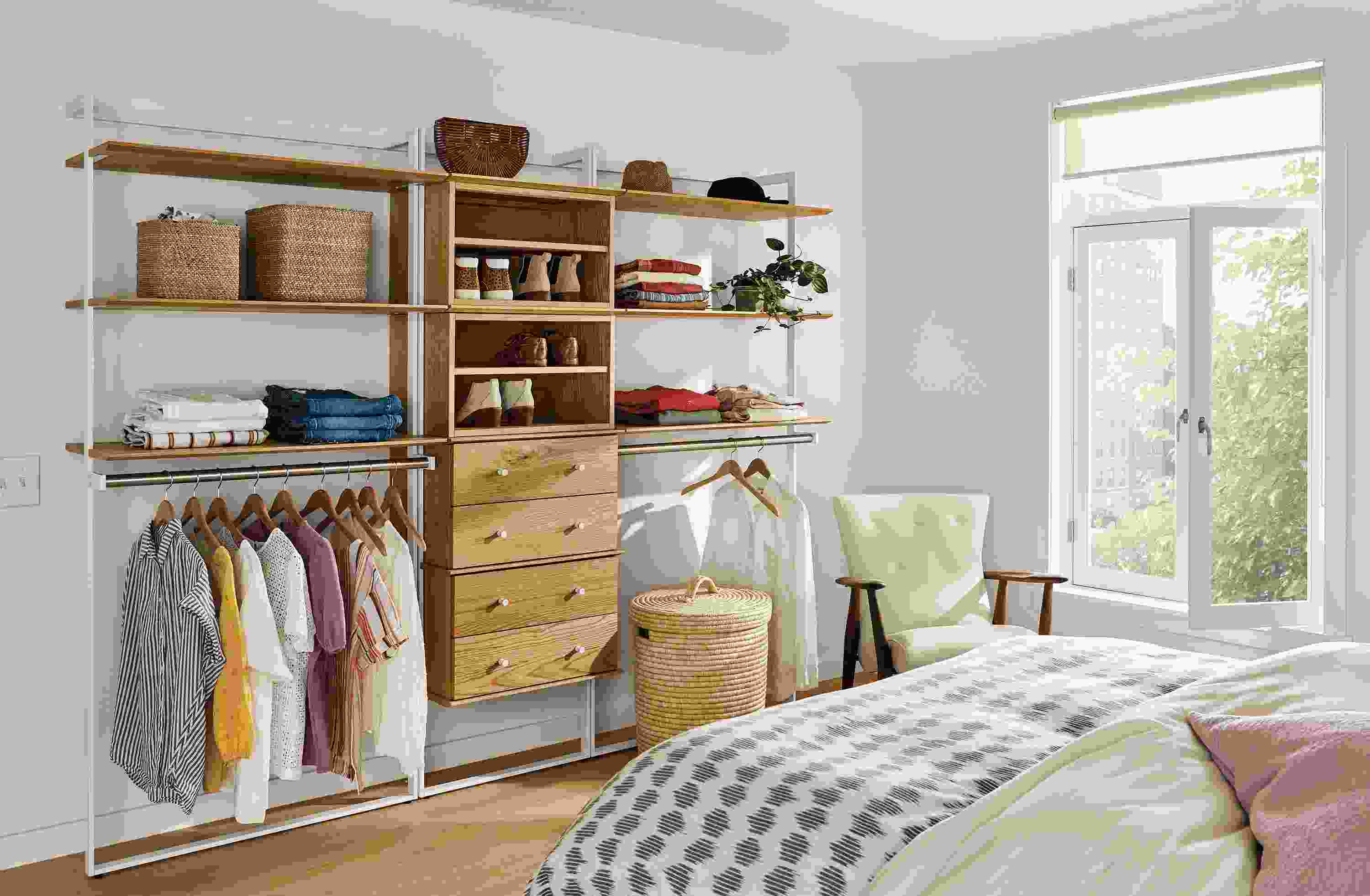 Bedroom with Beam 96-wide by 78-high Clothing Wall Unit in white with white oak Inserts and white hardware.