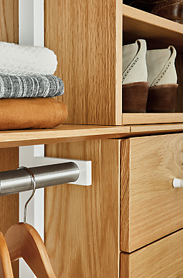 Detail of Beam 96-wide Clothing Wall Unit with Inserts in white and white oak.
