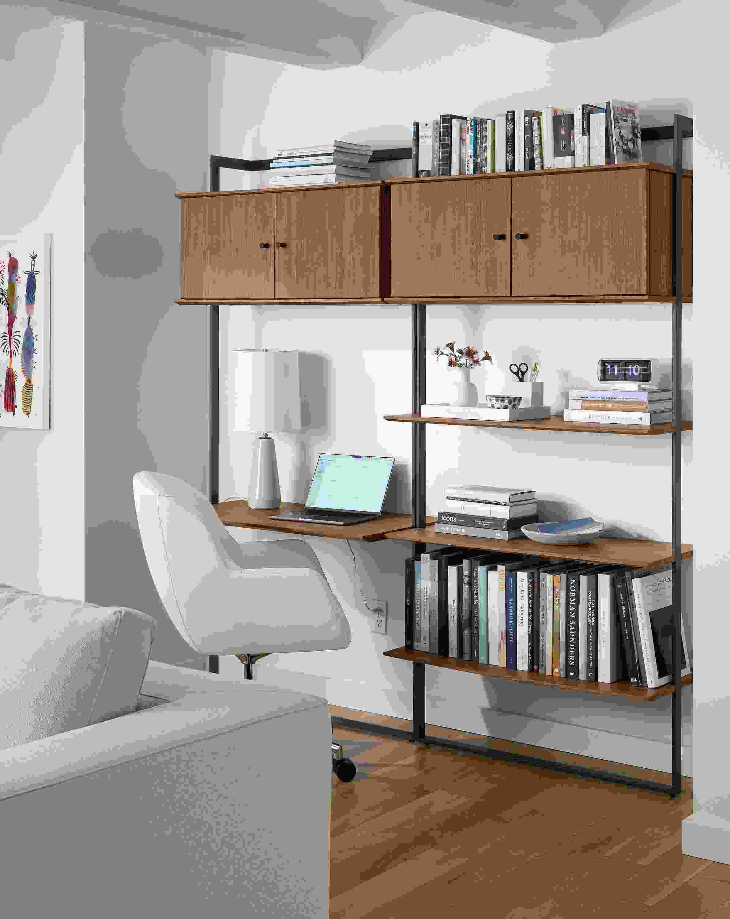 Office area with Beam 36-wide desk with 16-deep shelves in graphite with walnut and nico office chair in tatum bone.