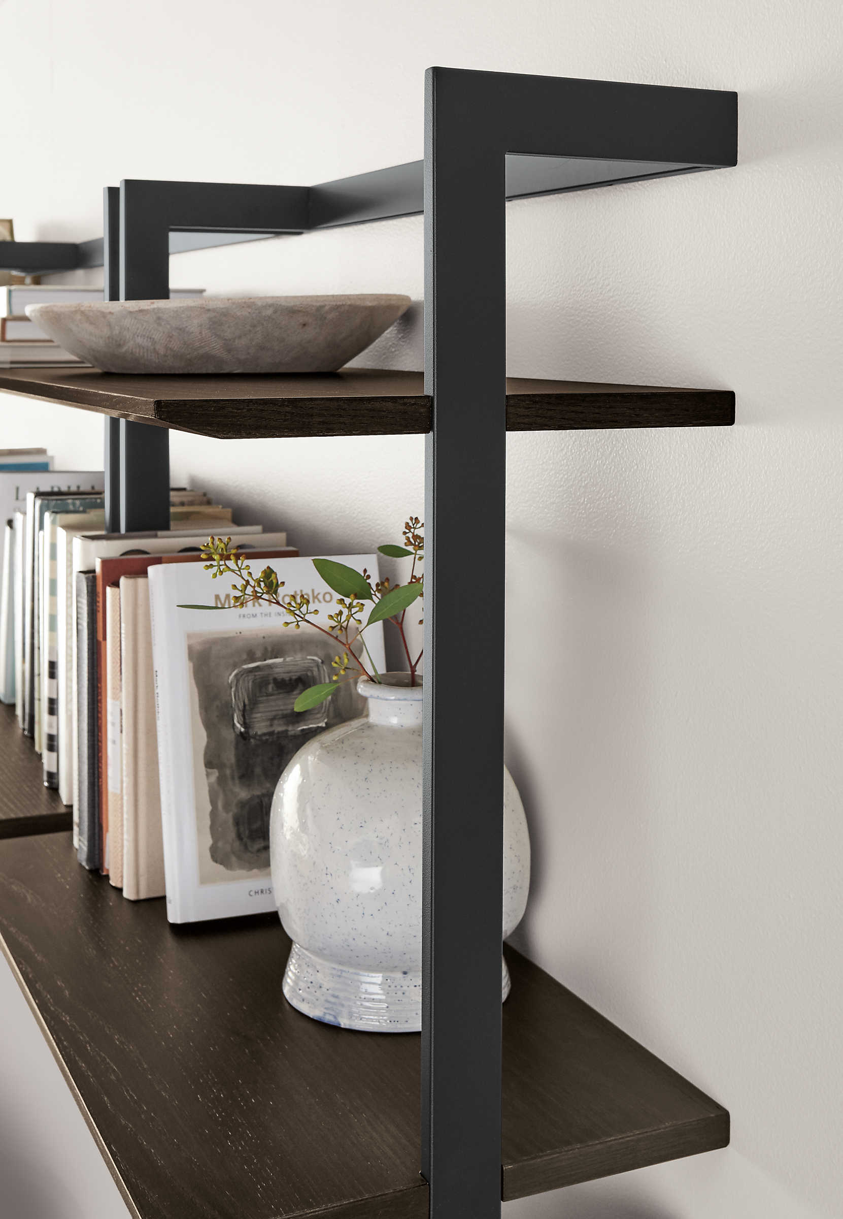 Detail of Beam leaning console bookcase