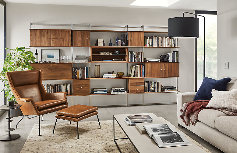 room setting with 140-inch wide beam bookcase in walnut.
