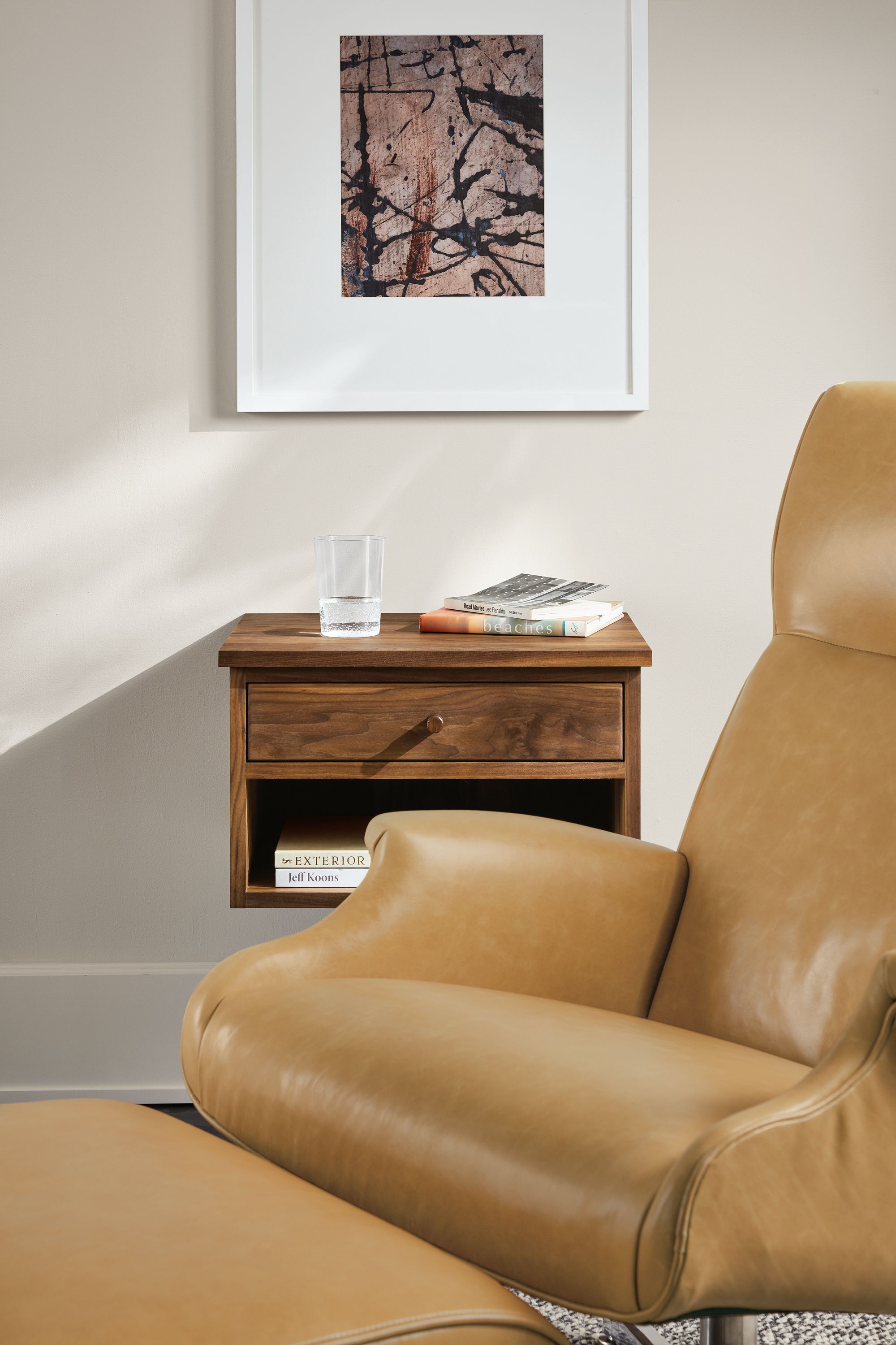 Close detail of camel leather on Beau chair.