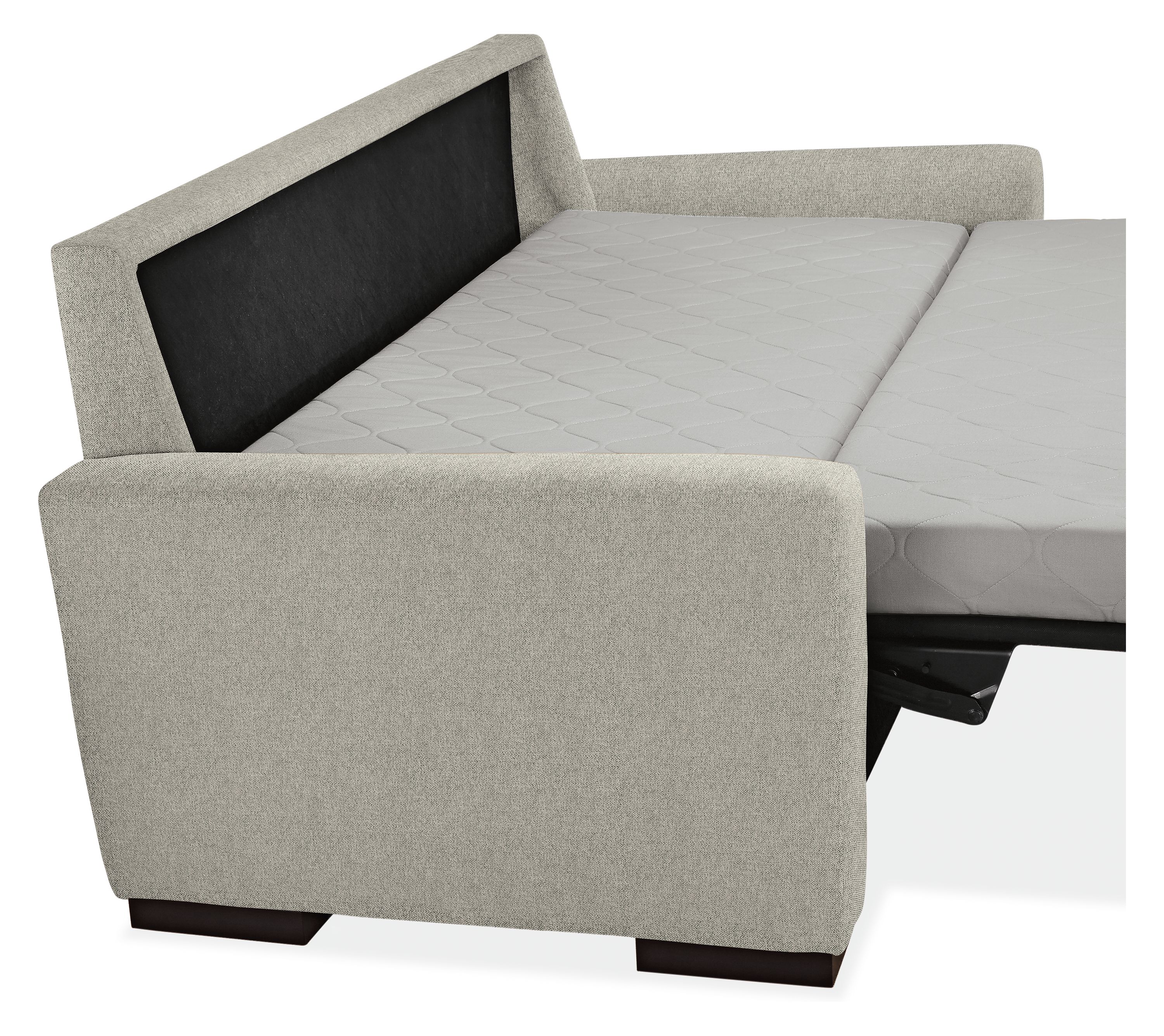 Angled side view of Berin sleeper sofa mattress in open position.