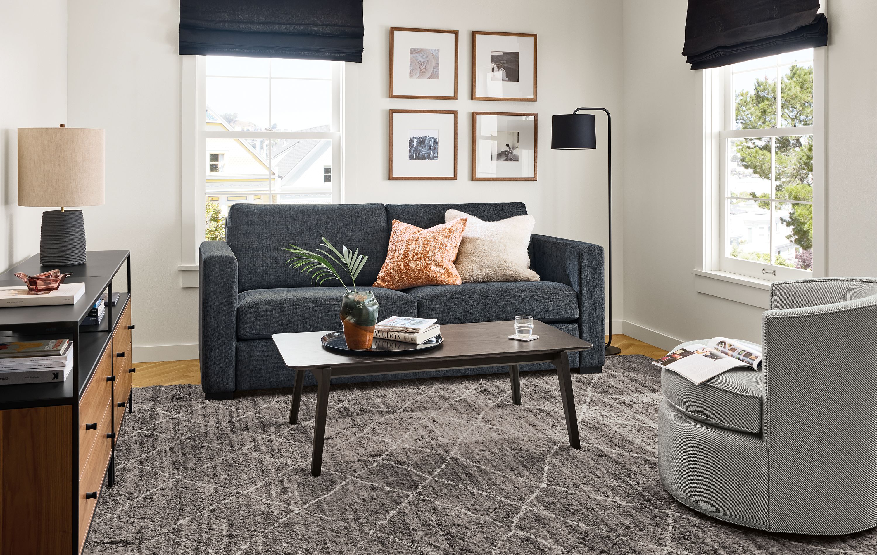 Wide arm 82" two-cushion queen plus sleeper sofa in Crawford navy fabric