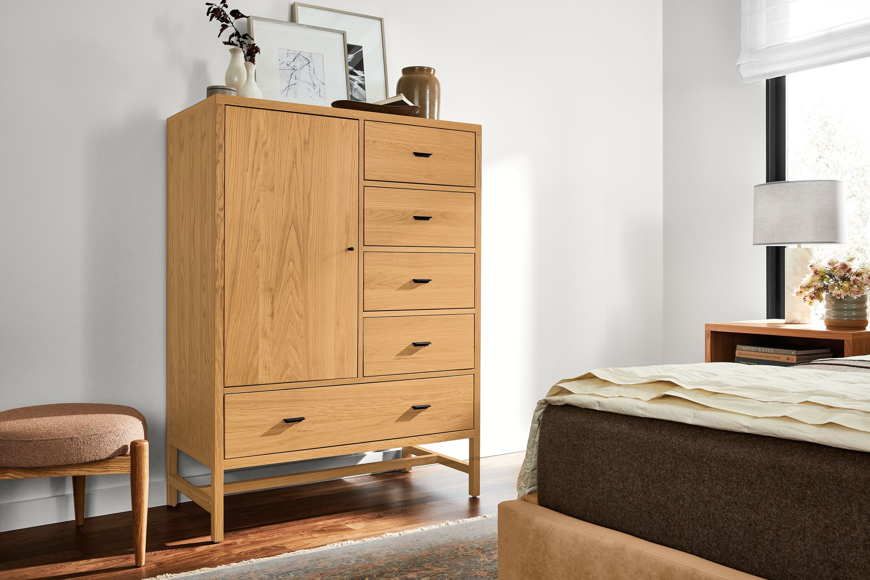 Detail of Berkeley storage cabinet in white oak in bedroom.