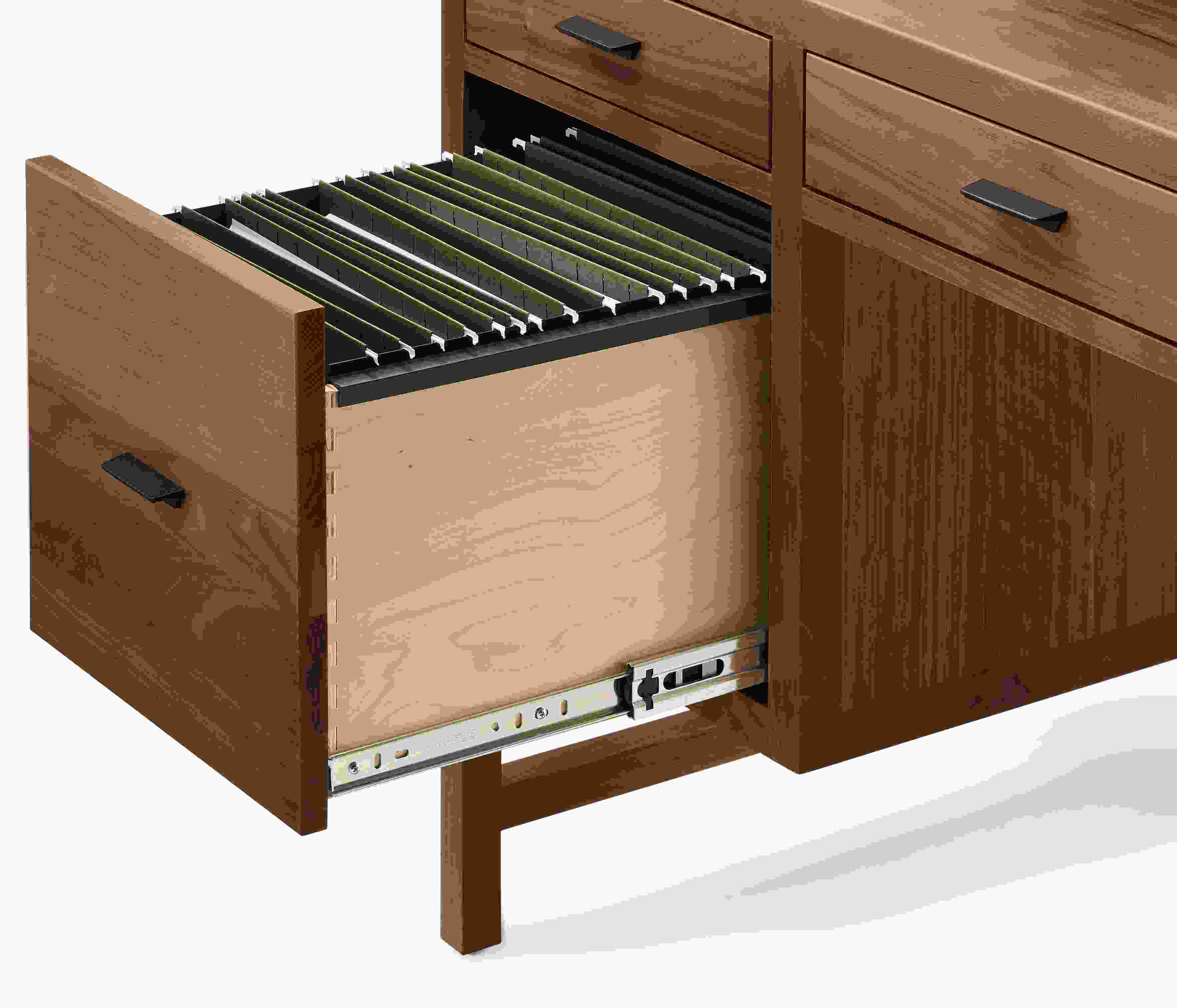 Close-up of open file drawer on Berkeley 66-wide desk in walnut showing showing letter size files folders.