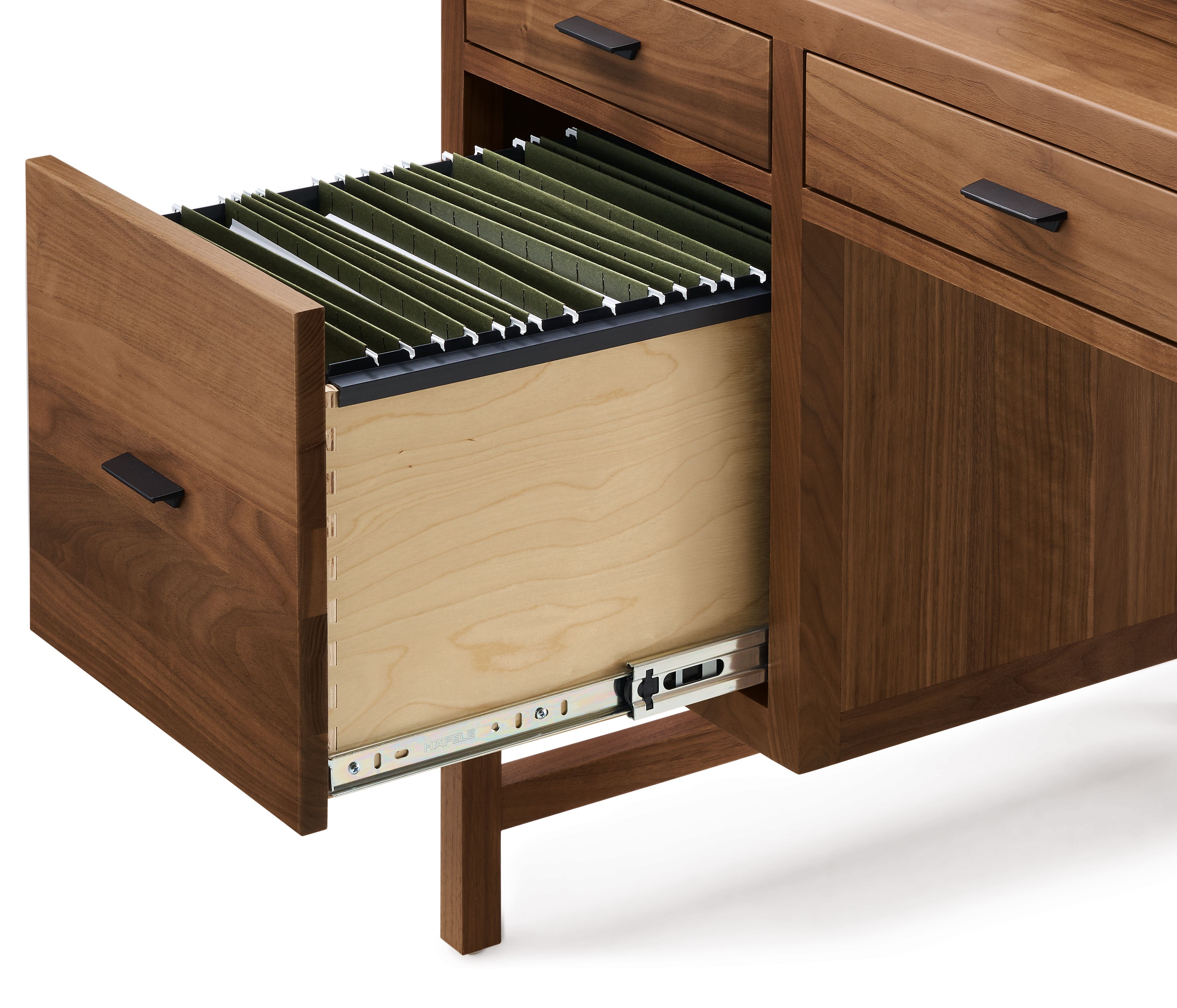 Close-up of open file drawer on Berkeley 66-wide desk in walnut showing showing letter size files folders.