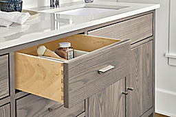 Close detail of Berkeley vanity with open drawer.