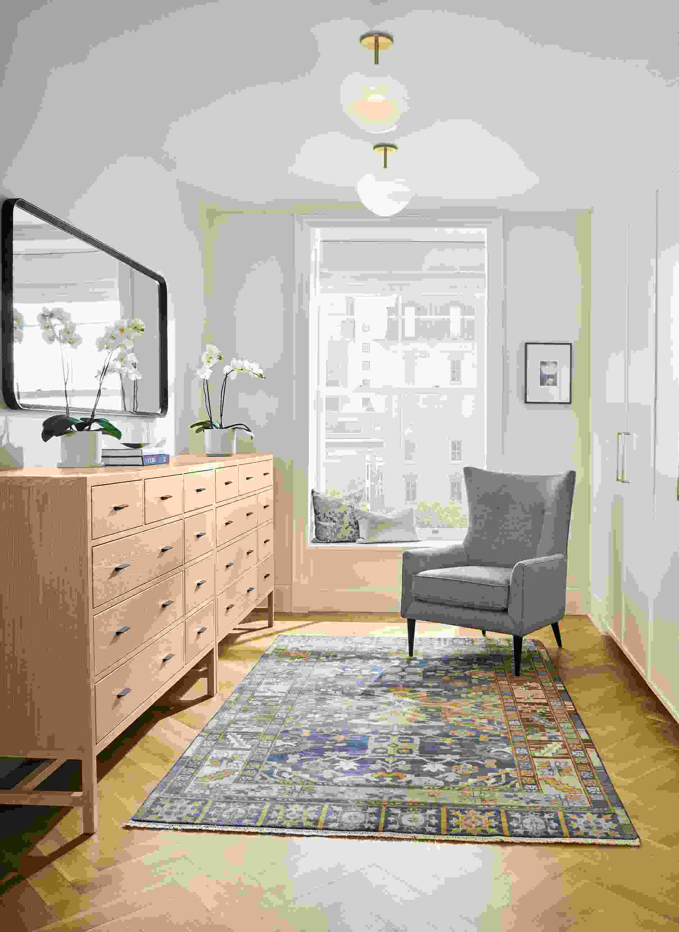 Bedroom dressing area with 2 Berkeley 9-drawer dressers and 5 by 8 Kayseri rug in Marine.