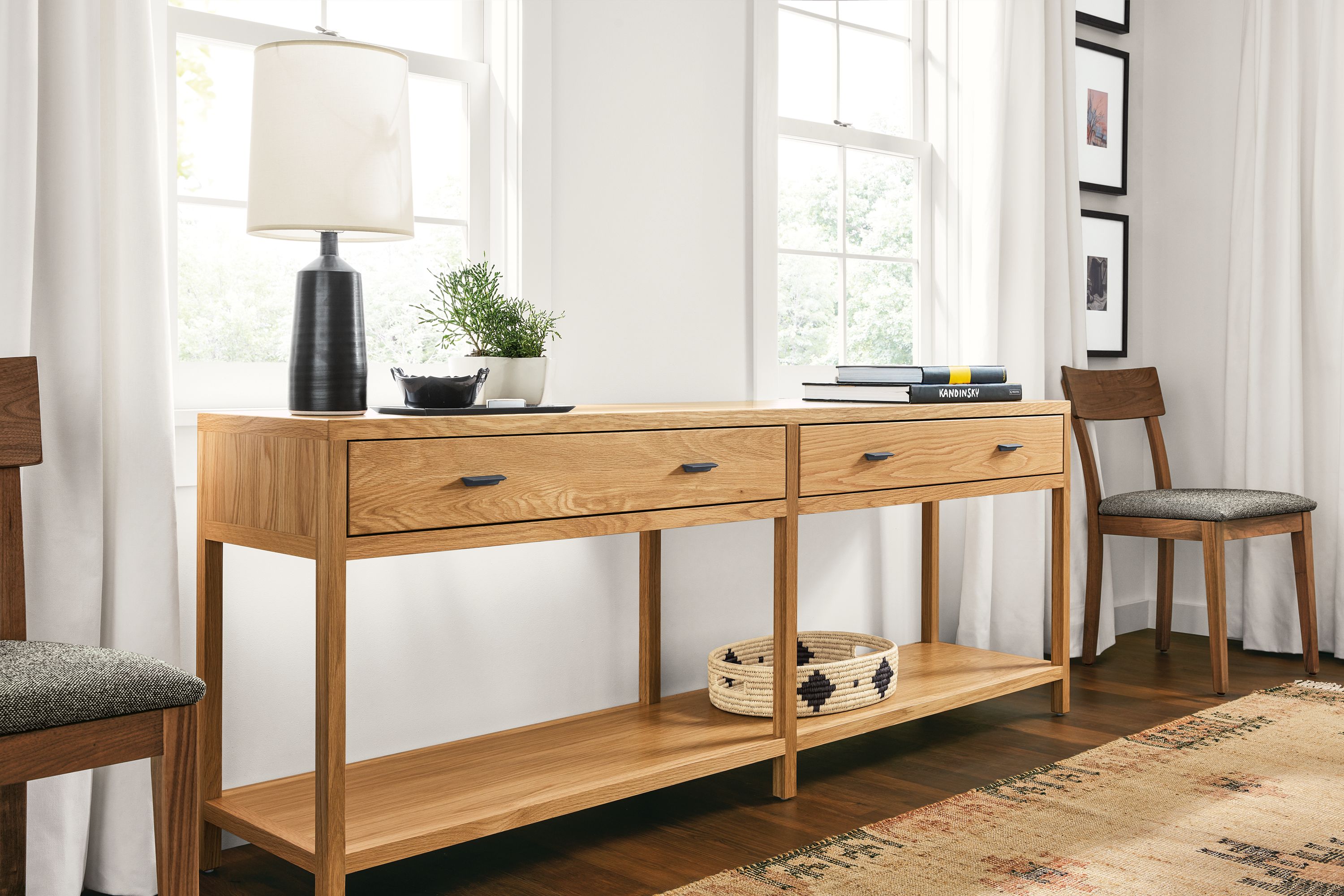 Detail of Berkeley console table in white oak beside living room window.