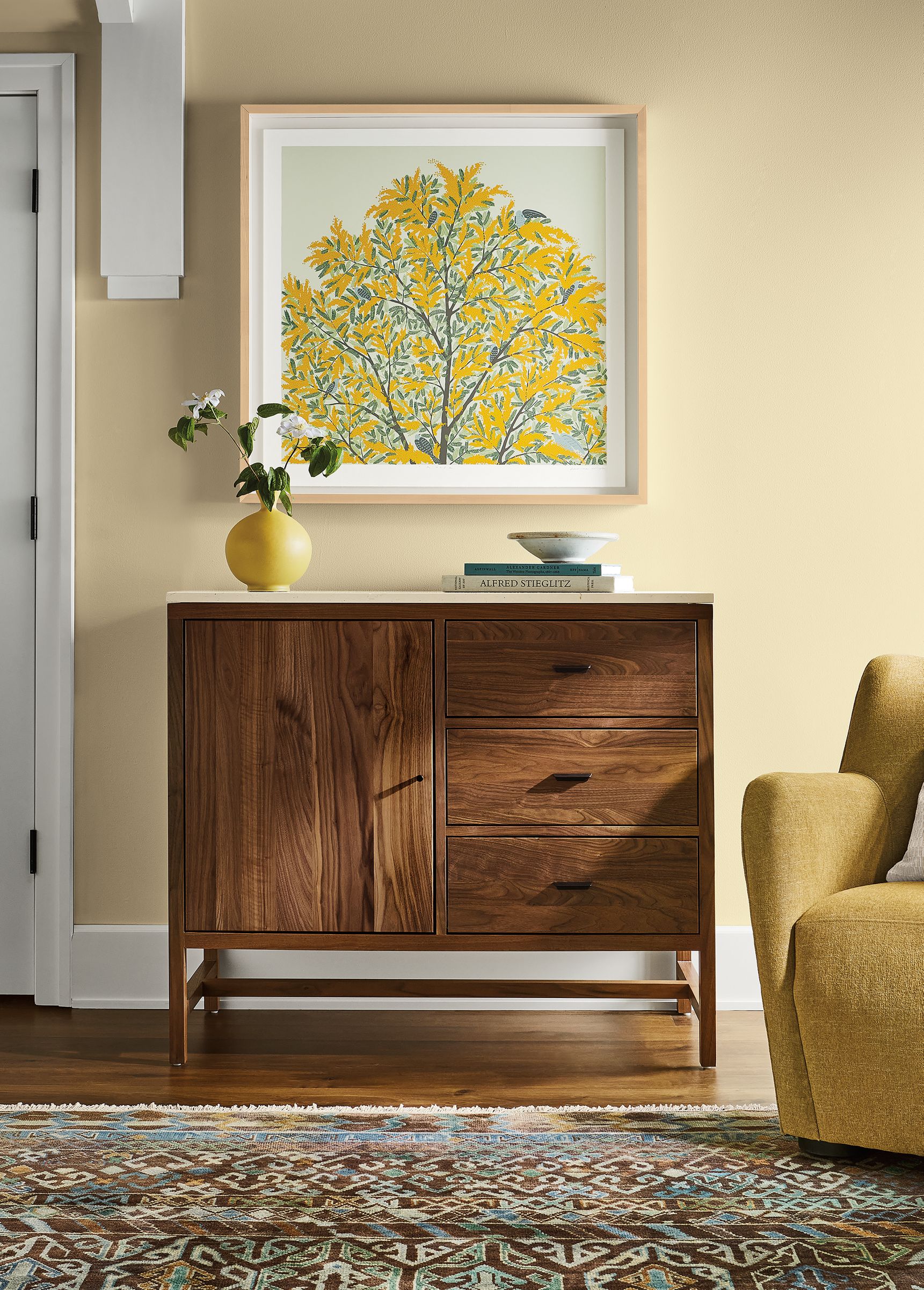 Living area with Berkeley 42-wide storage cabinet in walnut with Ecru Quartz top.