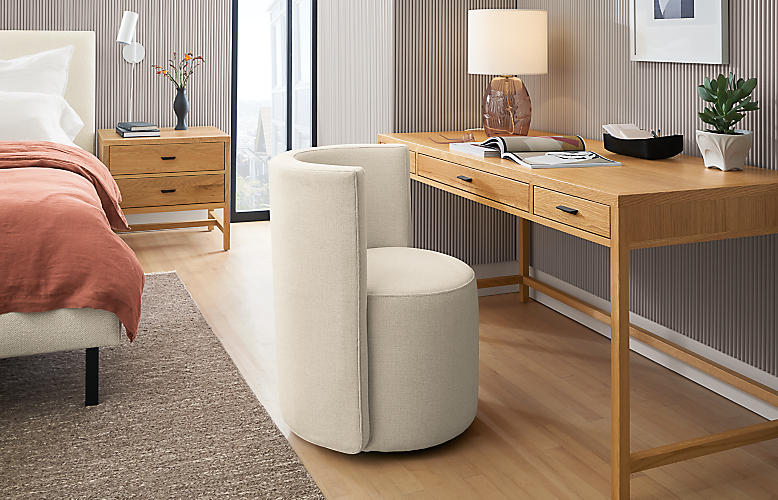 Berkeley 60-wide desk and two-drawer nightstand in White Oak with Como Chair in Sumner Ivory.