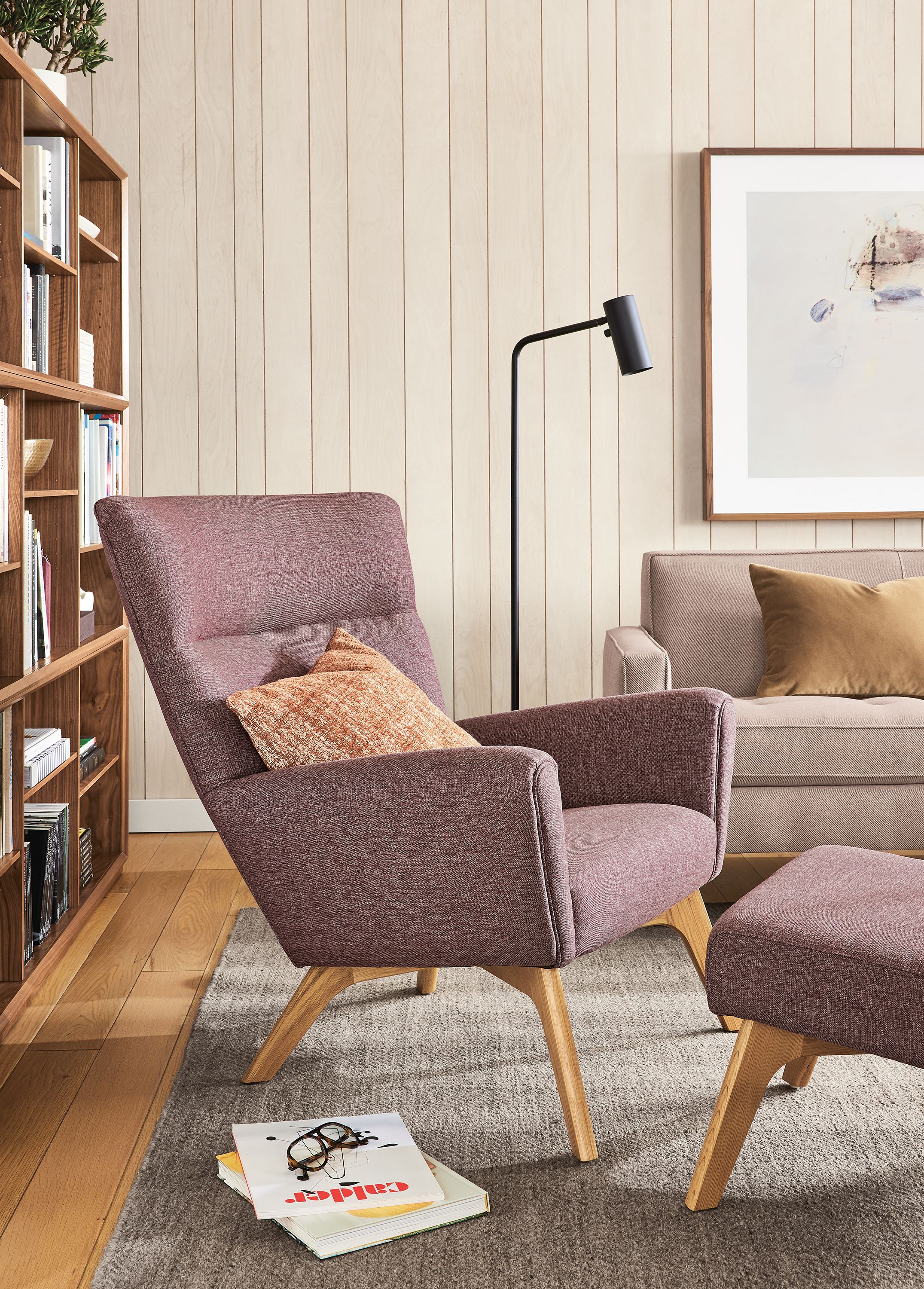 Living room with Boden chair and ottoman in Yana Mahogany and Reese sofa in Gino Paprika.