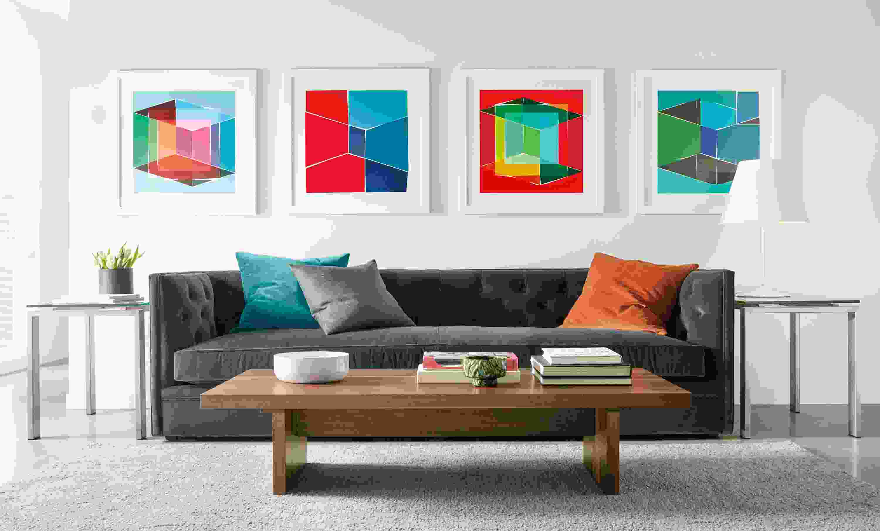 Four Henri Boissiere silkscressns above sofa.