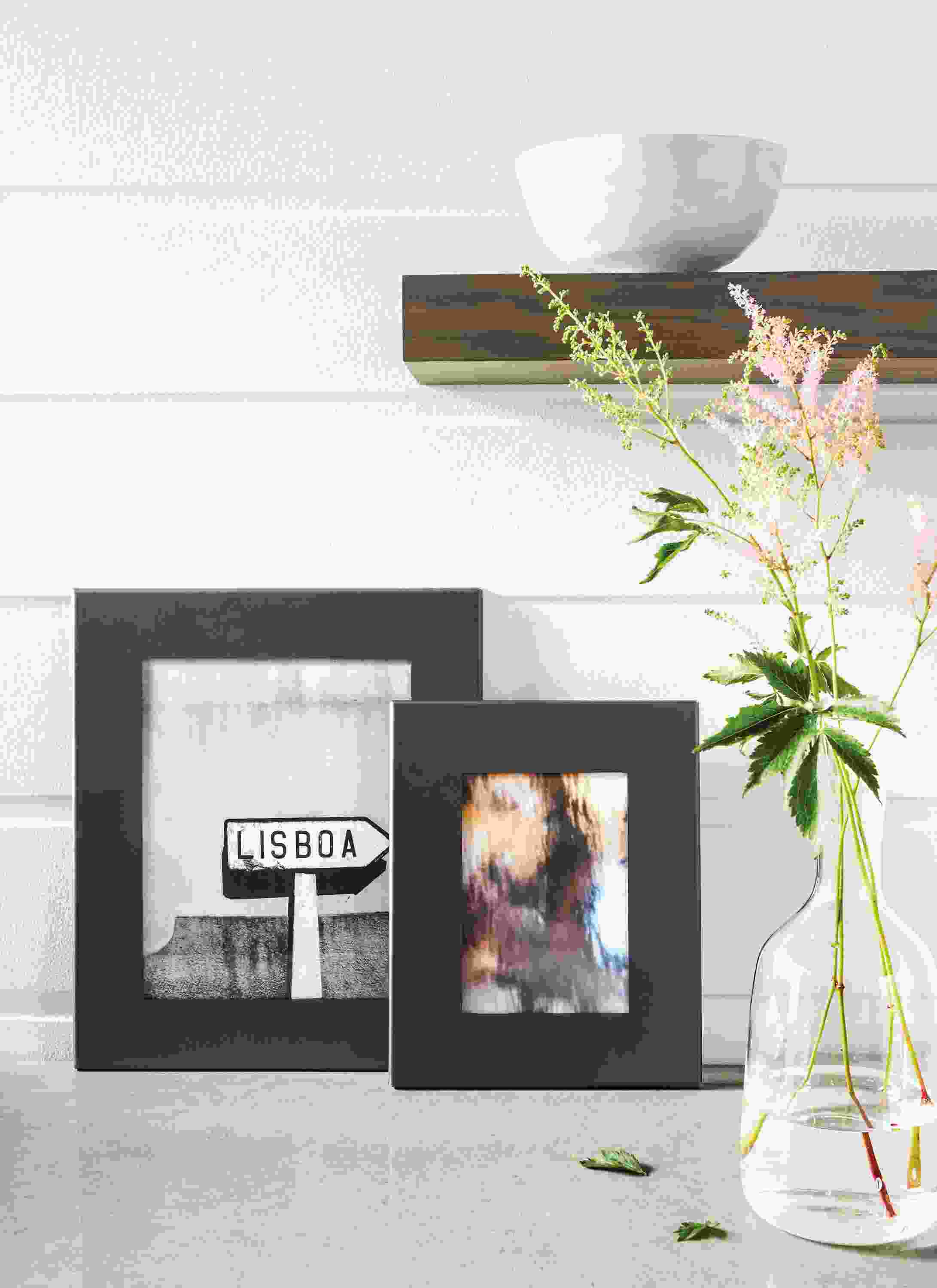 Detail of Borough, Manhattan and Bend picture frame wall in Natural Steel.