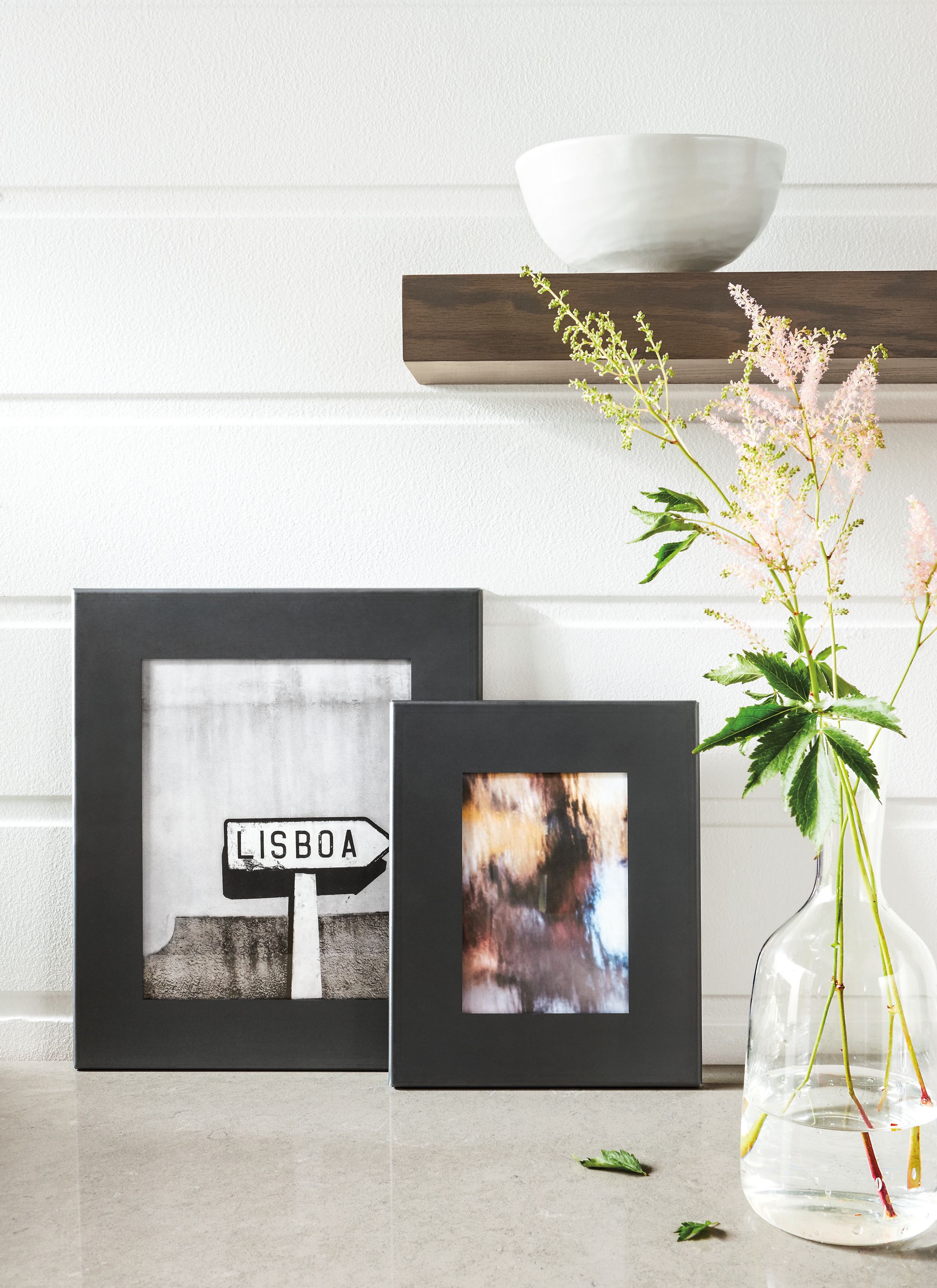 Detail of Borough, Manhattan and Bend picture frame wall in Natural Steel.