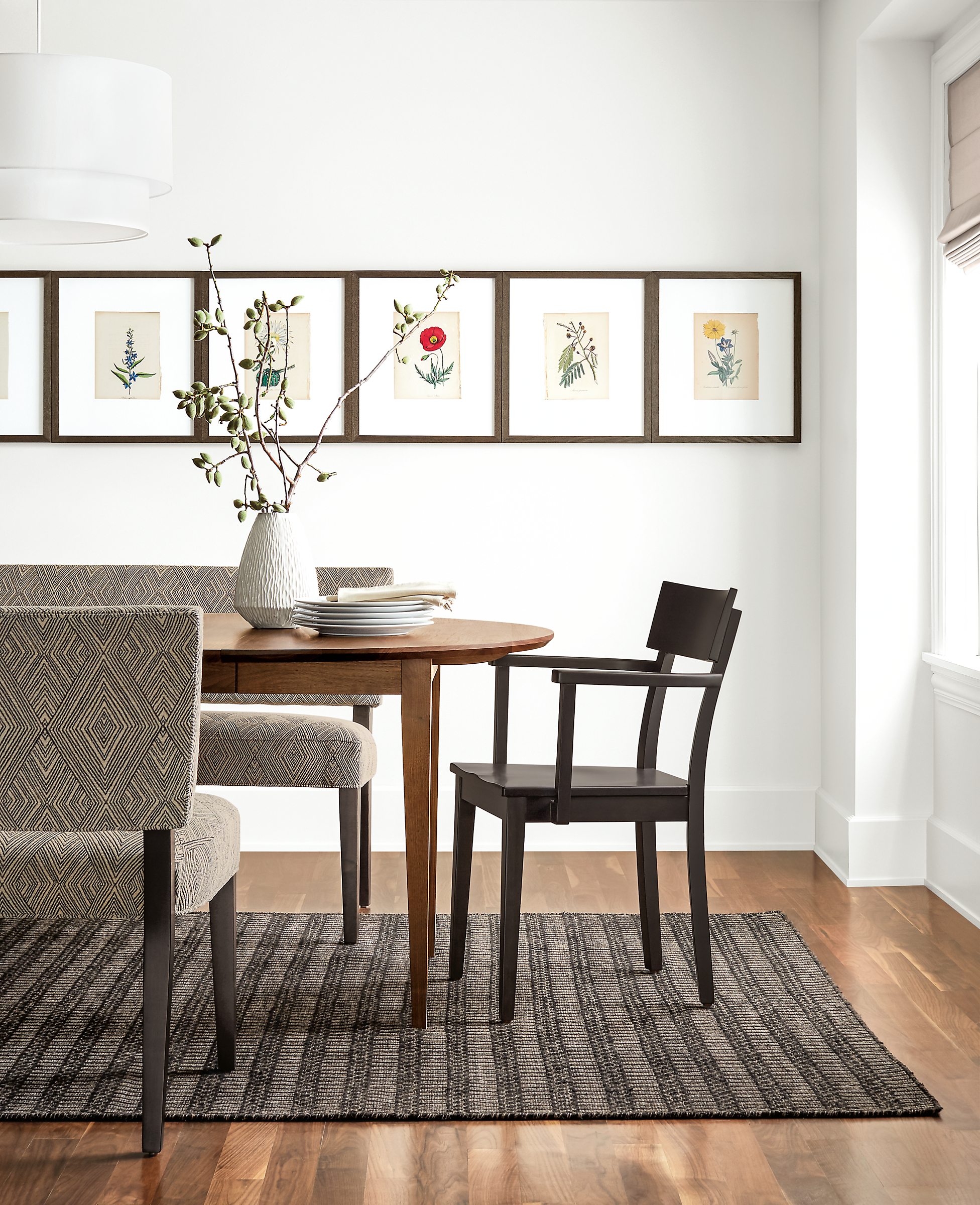 Detail view of six Botanical framed prints in dining room.