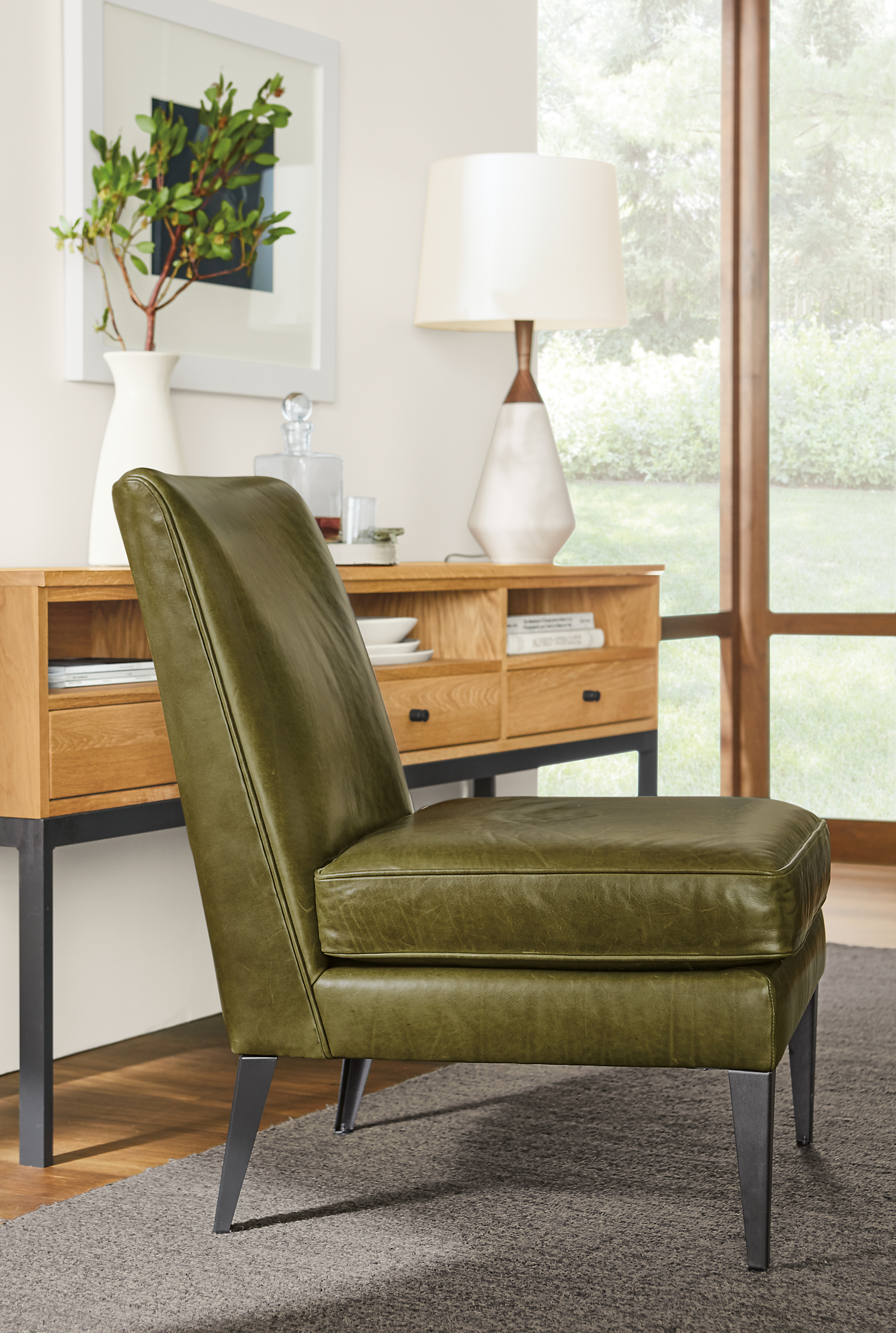 Detail of Bree chair in Vento Olive leather.