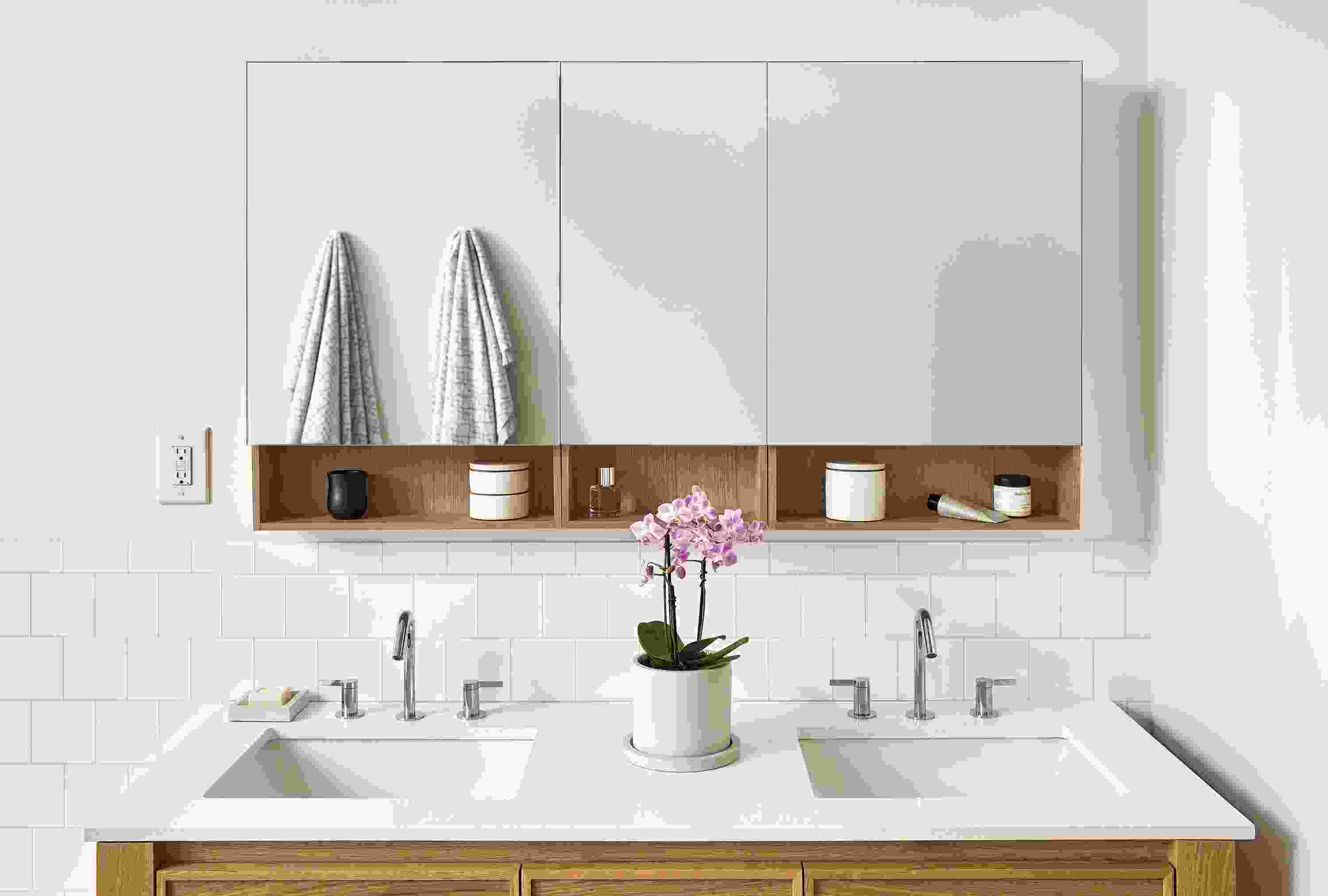 Bathroom with Bridger 53.25 wide, 3-door medicine cabinet and Amherst 60 wide vanity in rye on red oak.