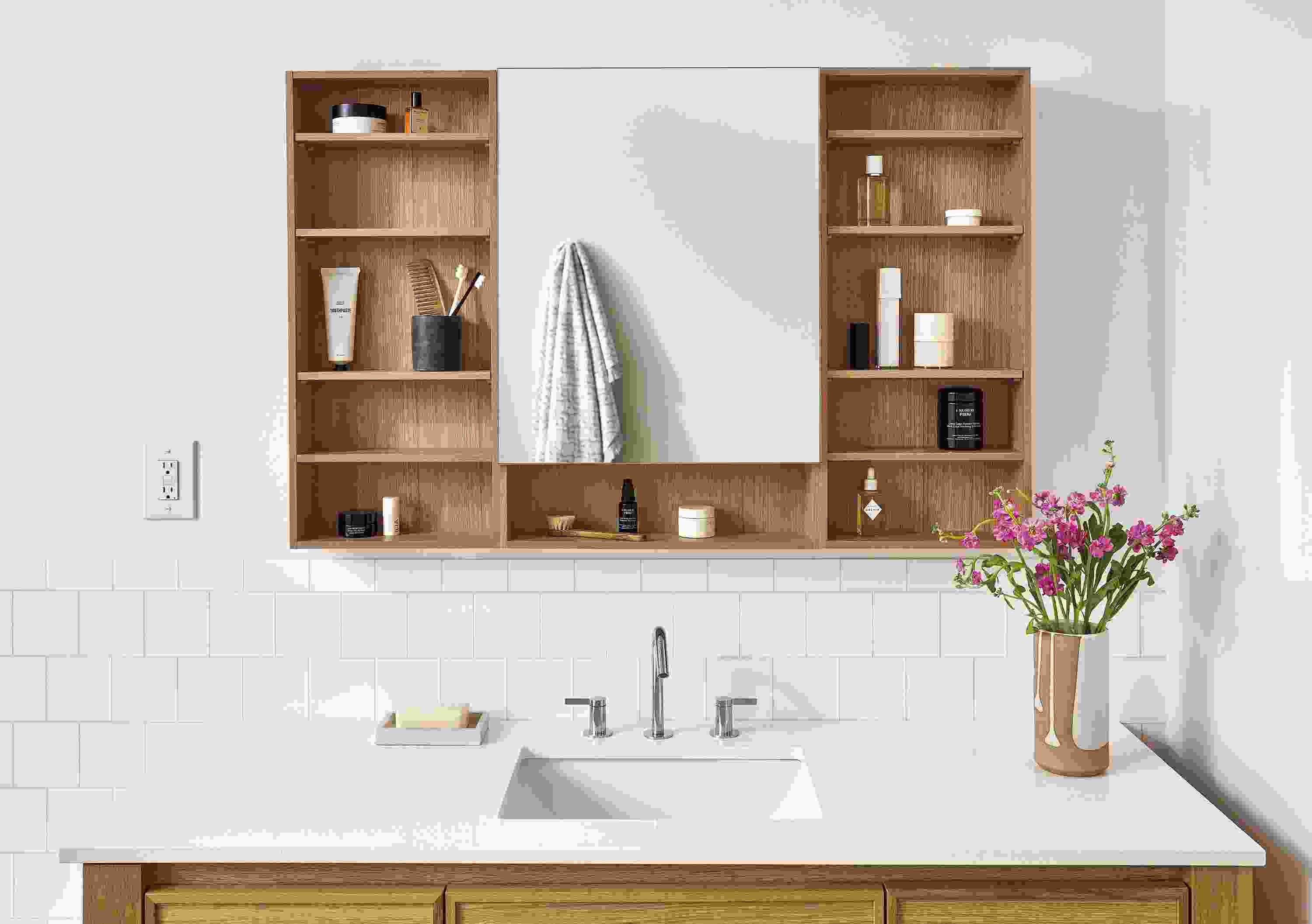 Bathroom with Bridger 46.5 wide medicine cabinet in rye on red oak and Amherst 60-wide vanity in white oak with white quartz top.
