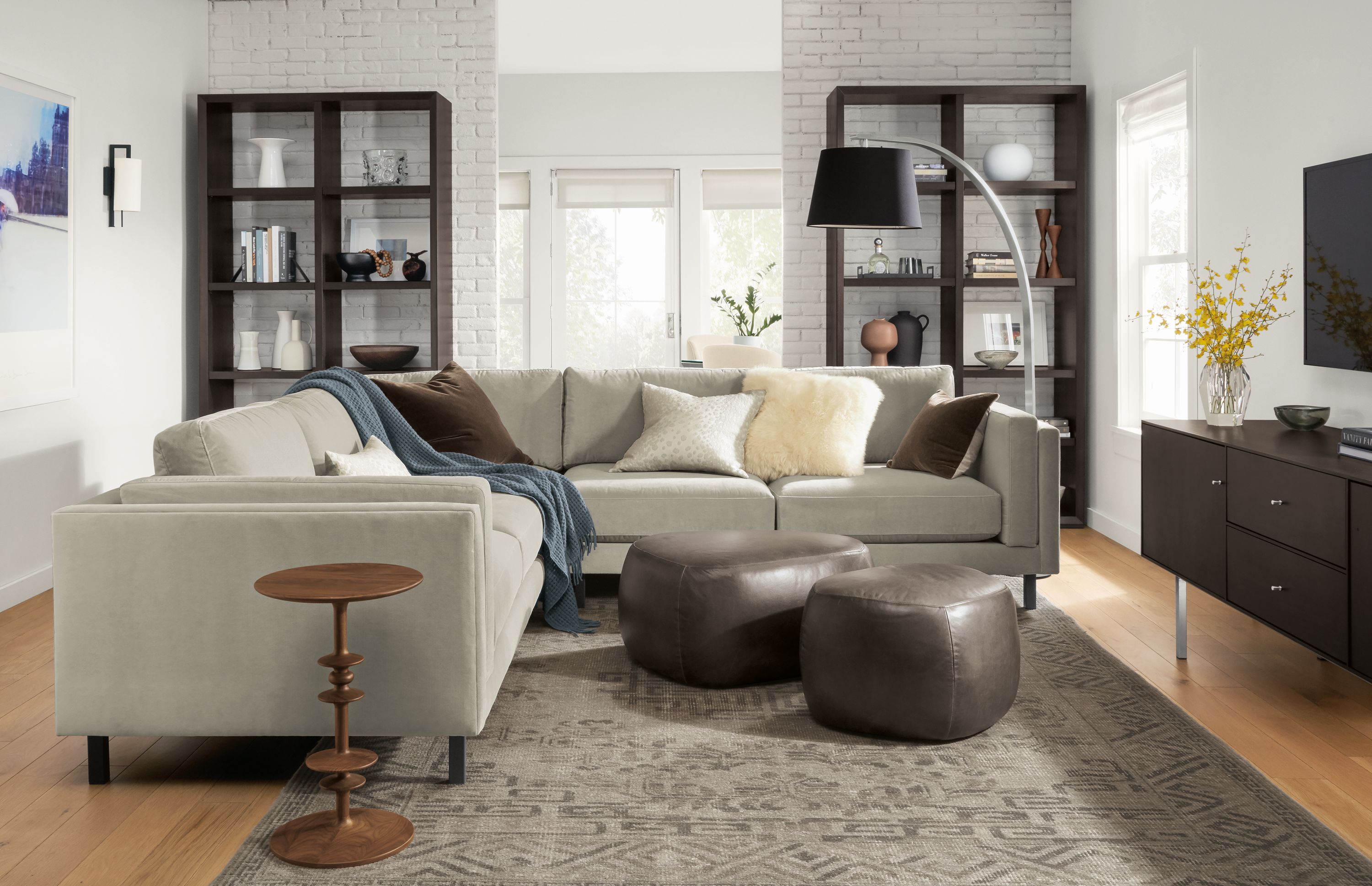 32"w & 25"w ottomans in Vento smoke leather