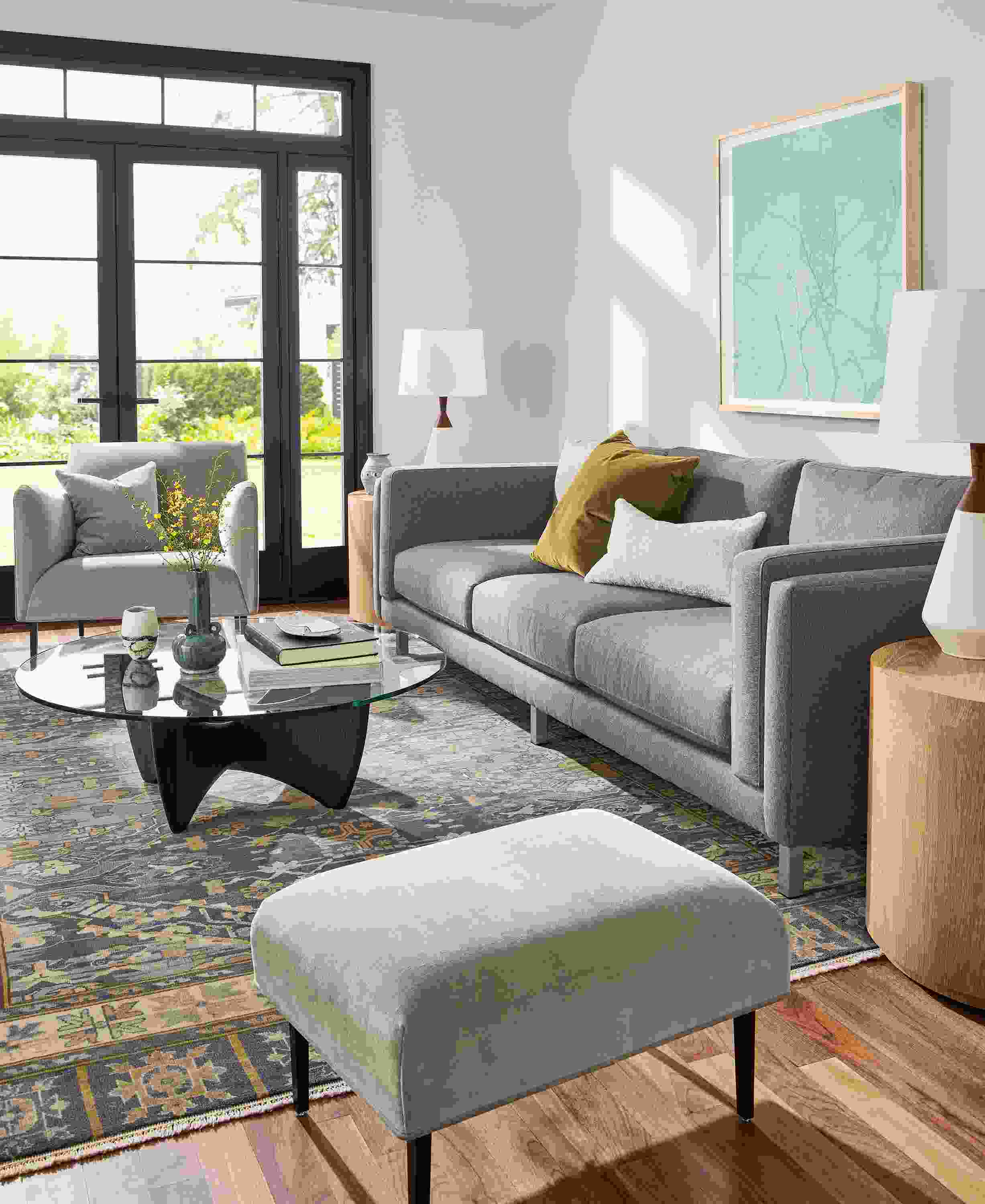 living room with 101-wide cade sofa, matteo ottoman, sanders coffee table,
