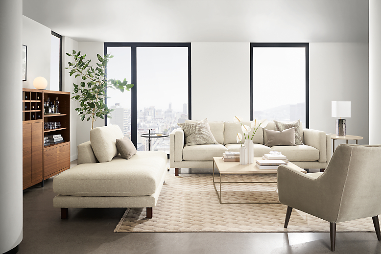Living room setting with Cade sofas, Quinn chair and Classic coffee table.