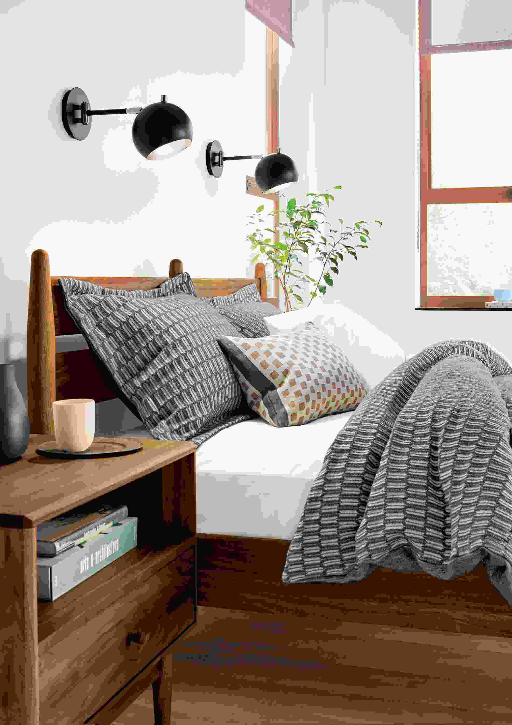 Two Camber wall sconces above Grove bed.
