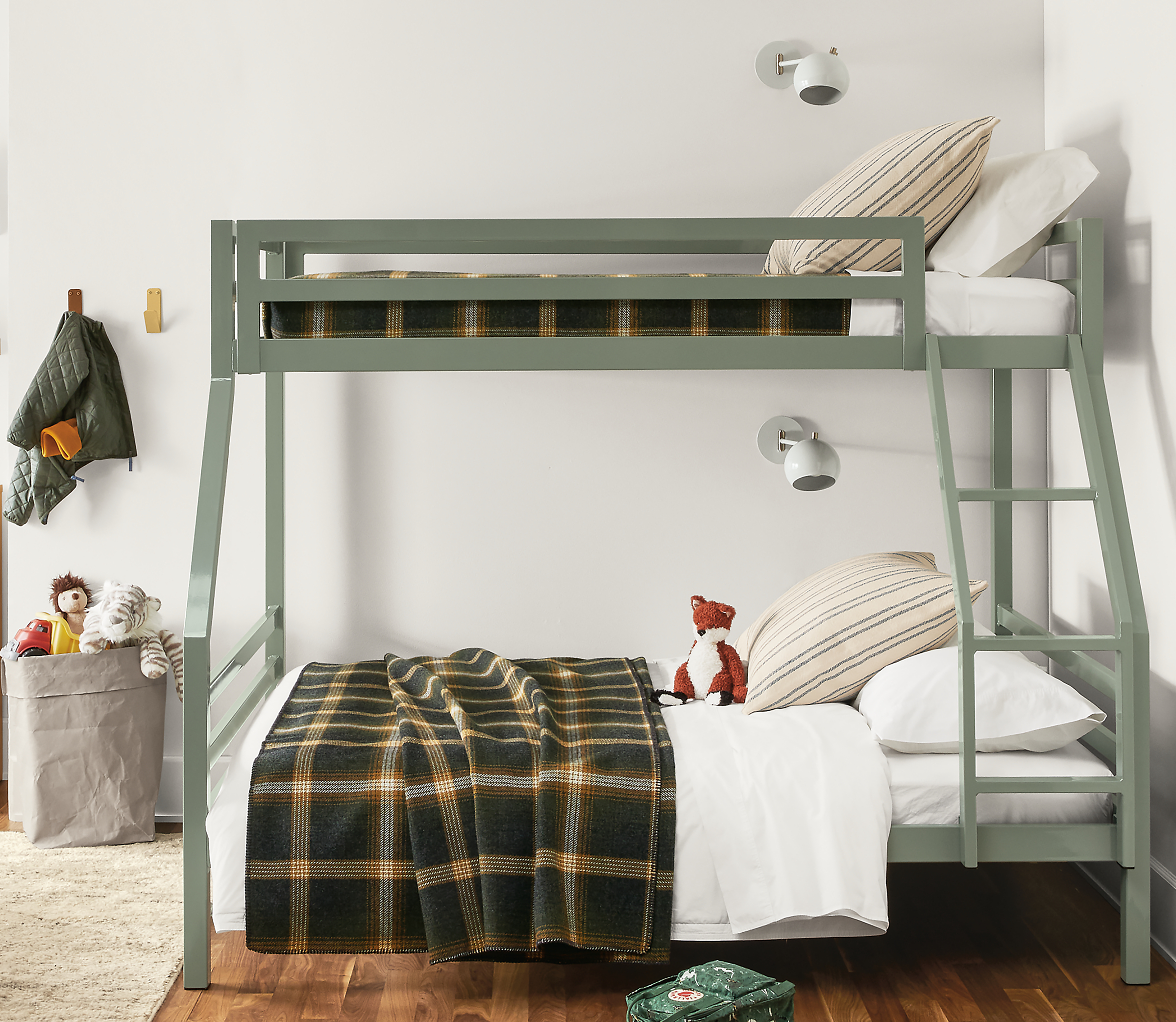 Detail of Fort twin over twin full bunk in Sage powdercoat in kids bedroom.