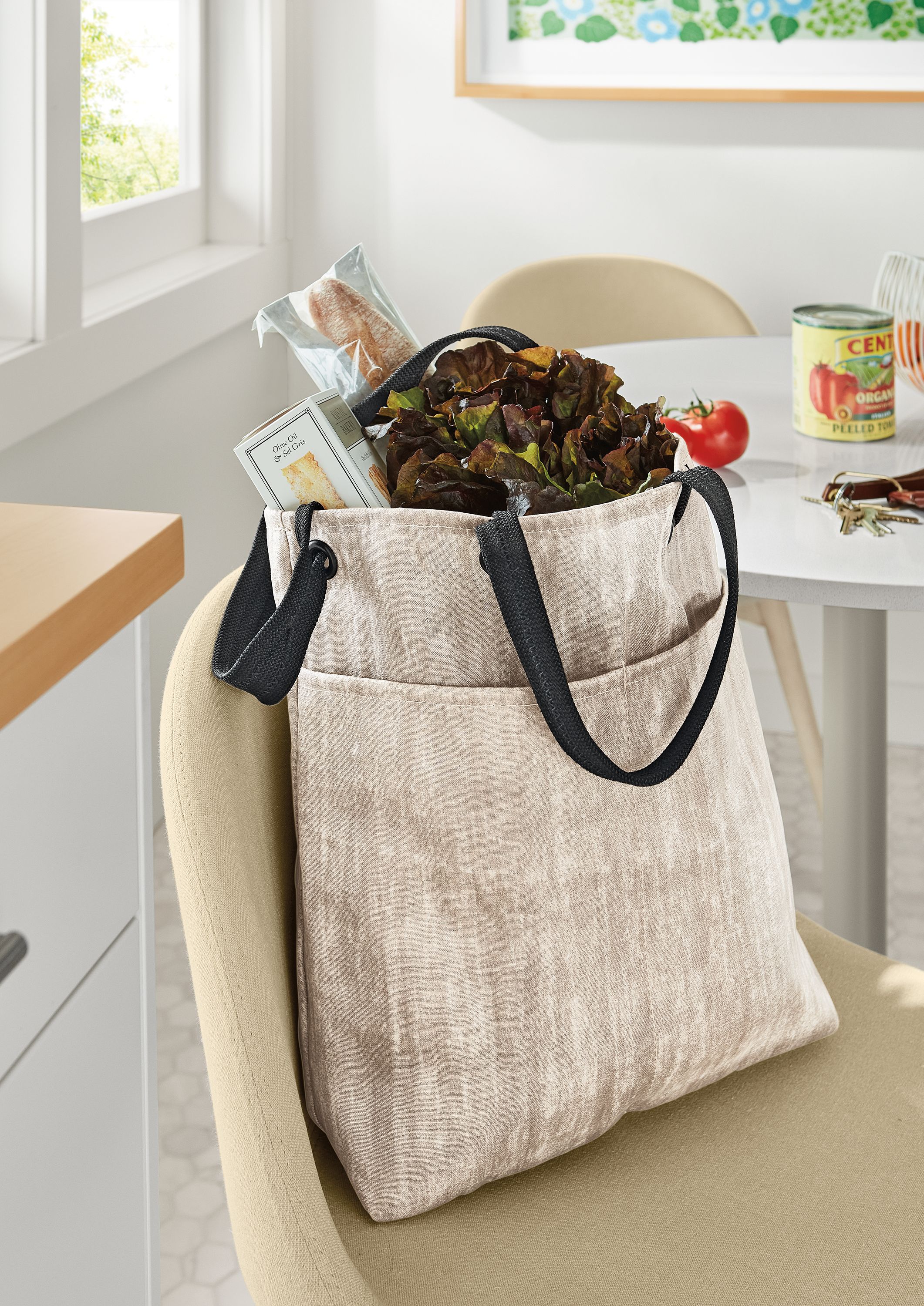 Close up of Cameo Tote on Bernard dining chair.