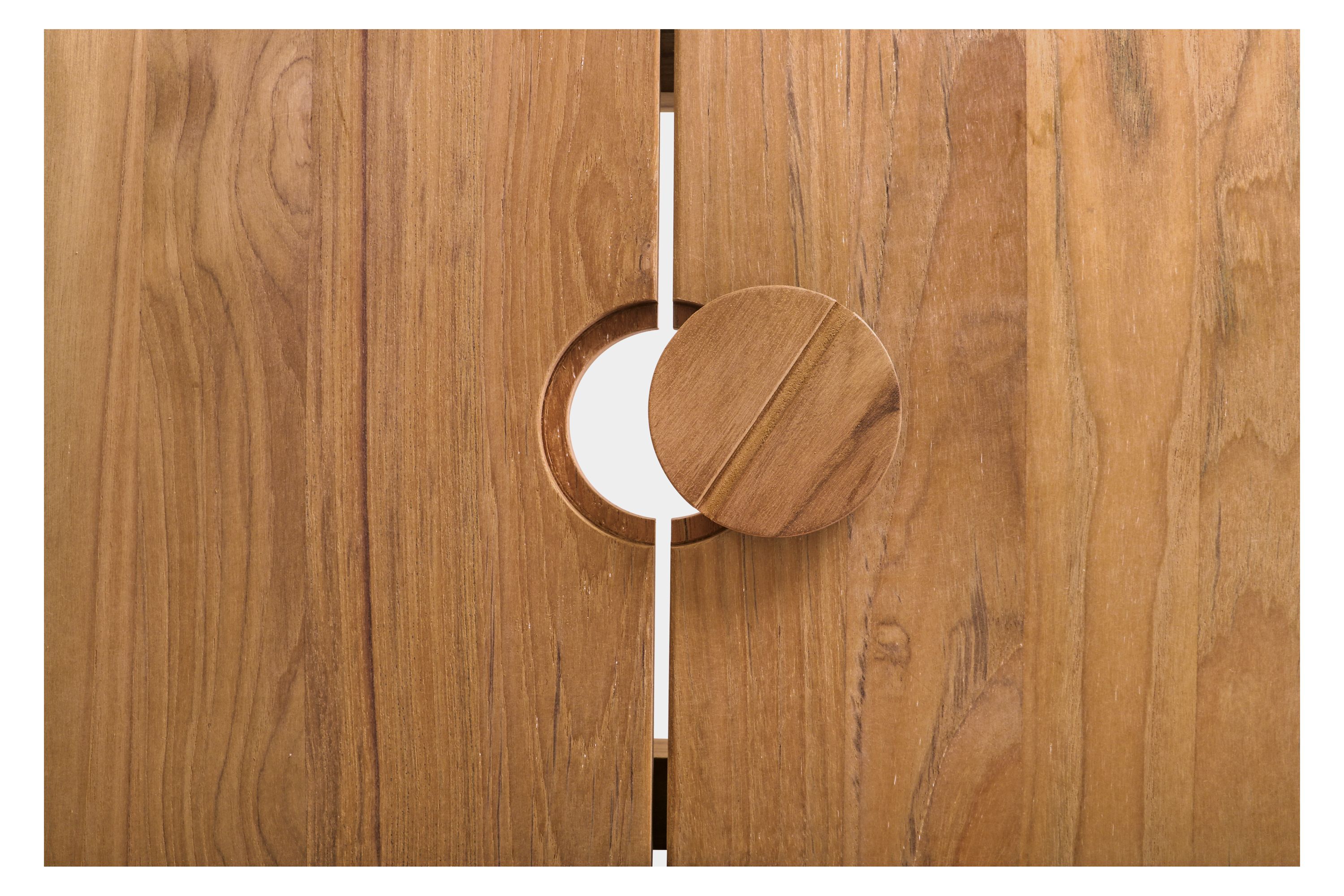 Angled view of Capri 65w 40d 30h Table with Umbrella Hole in Teak.