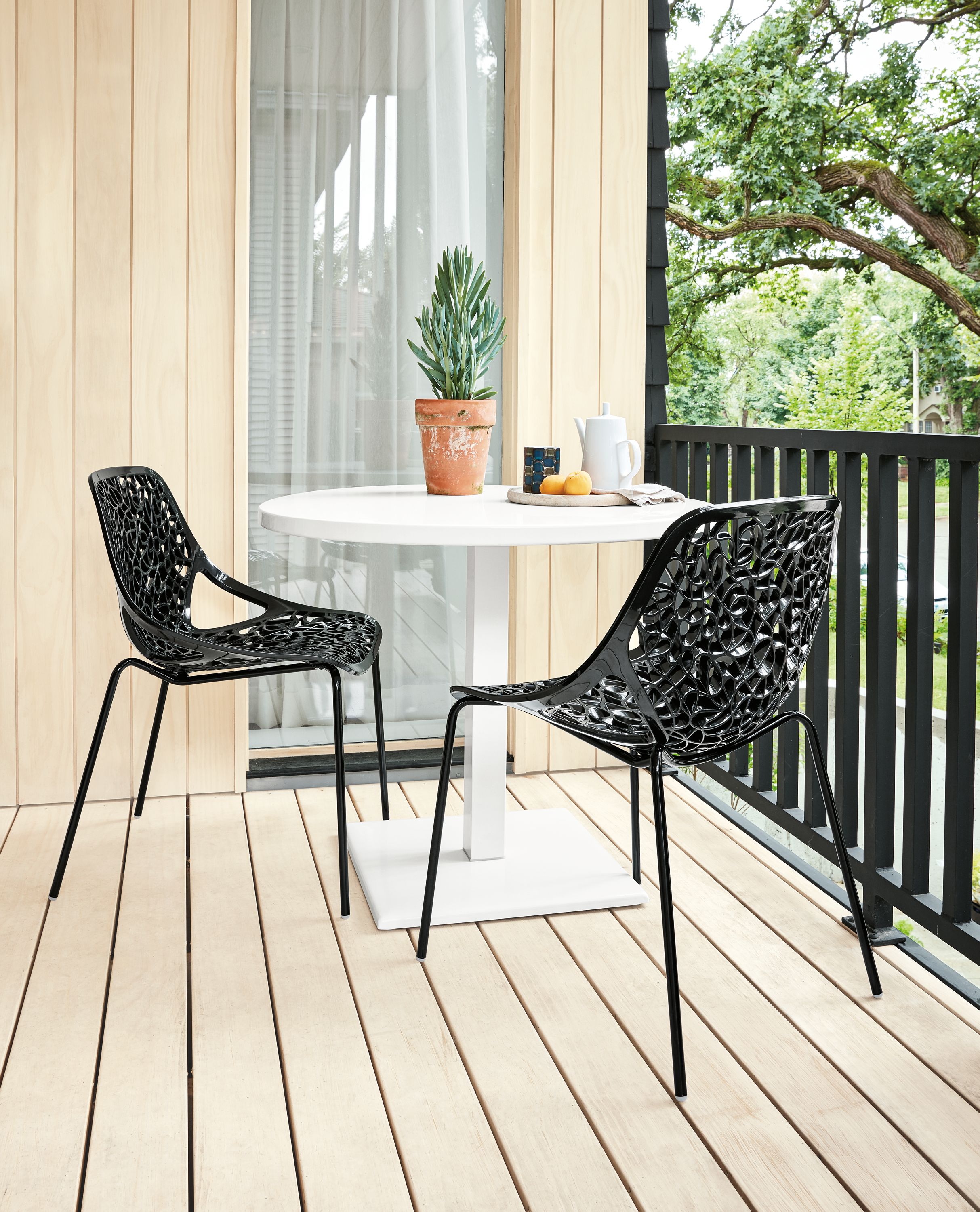 Detail of two Caprice side chairs.