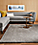 Detail view of Naomi sofa and Cardiff rug.
