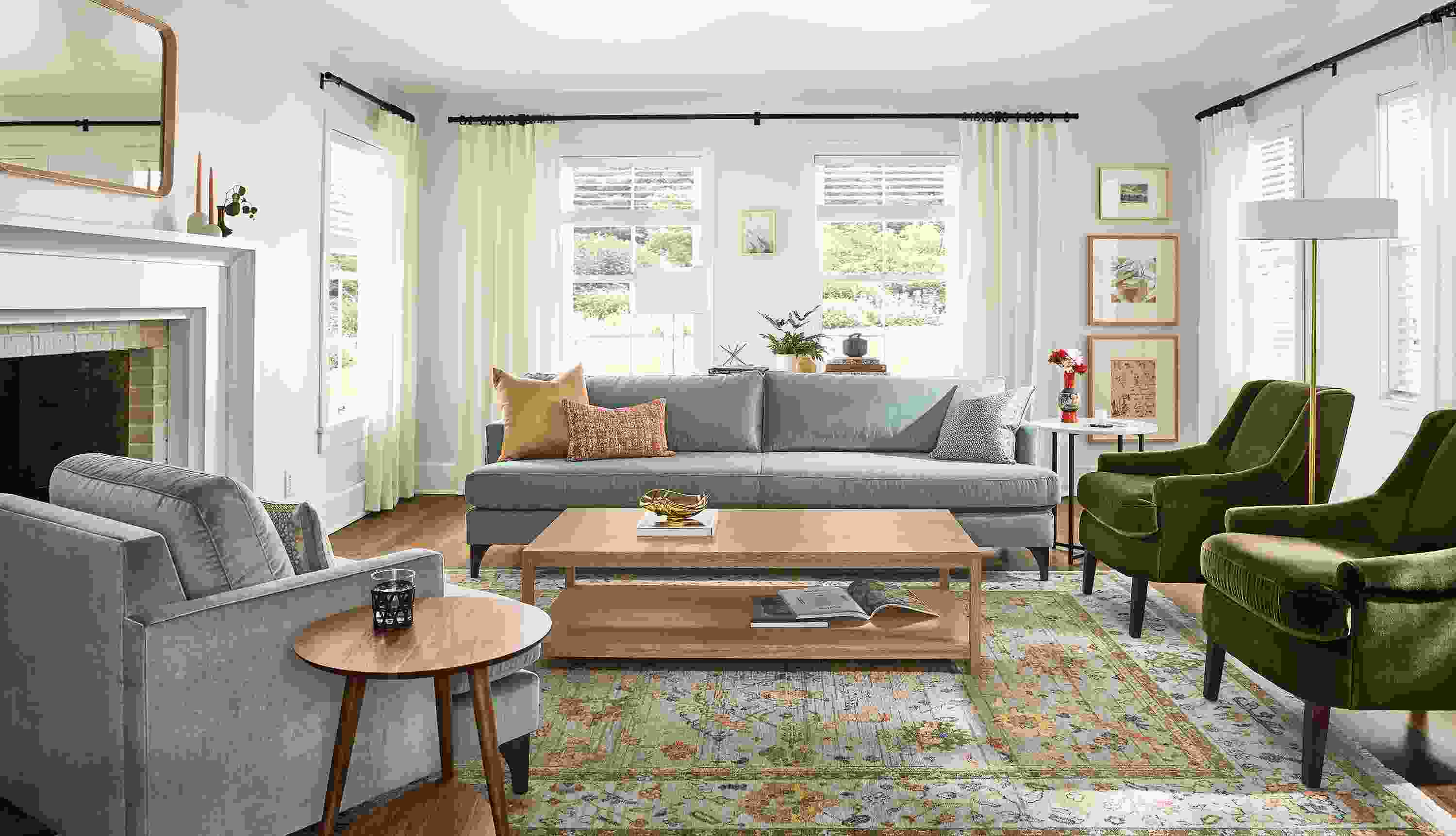 Living room with carlton bench-cushion sofa and carlton chair in windsor cloud and louise chair in Redding Olive.