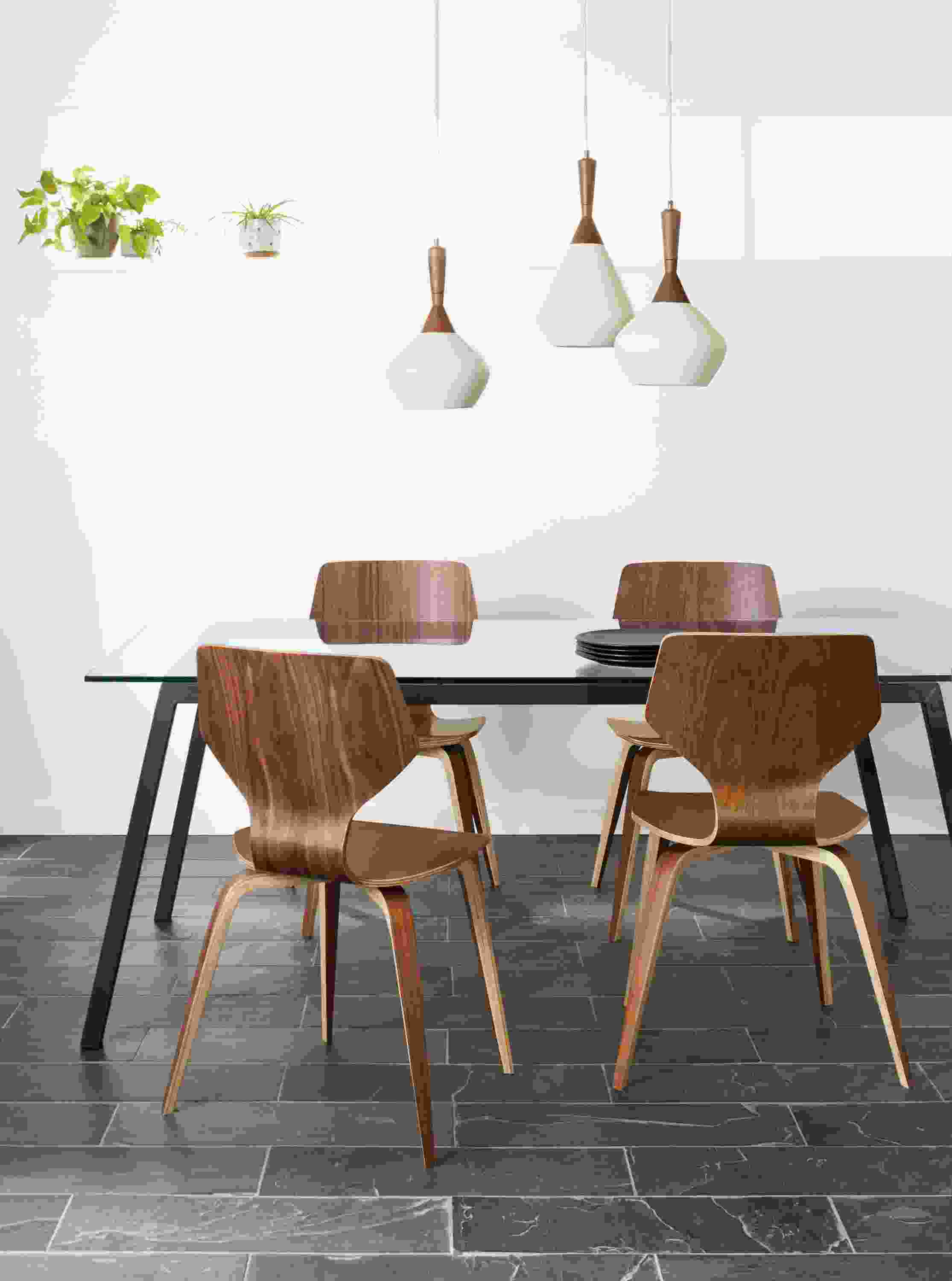 Detail of Cass dining table with glass table top.