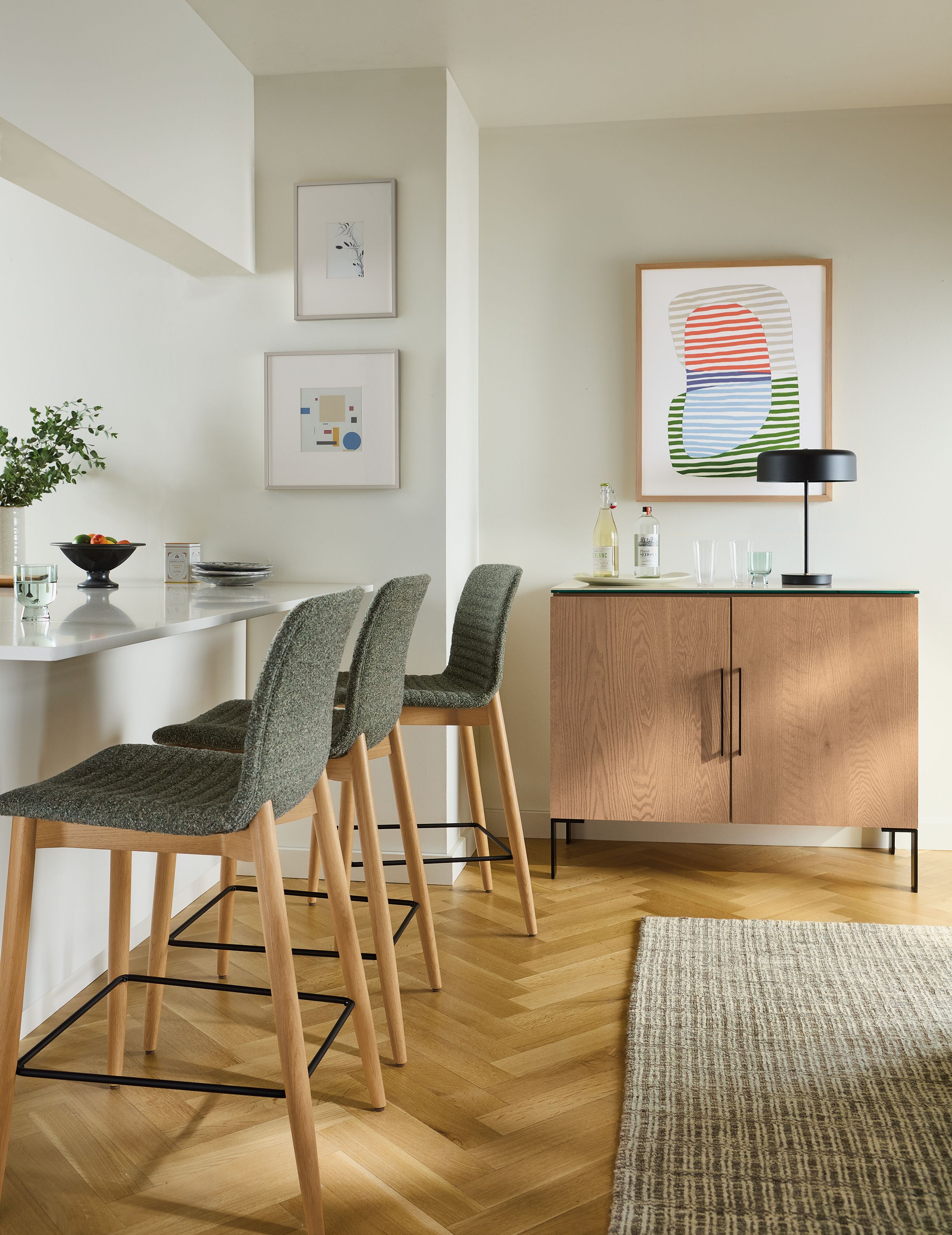 Counter stool in Zavin pine fabric with white oak wood legs