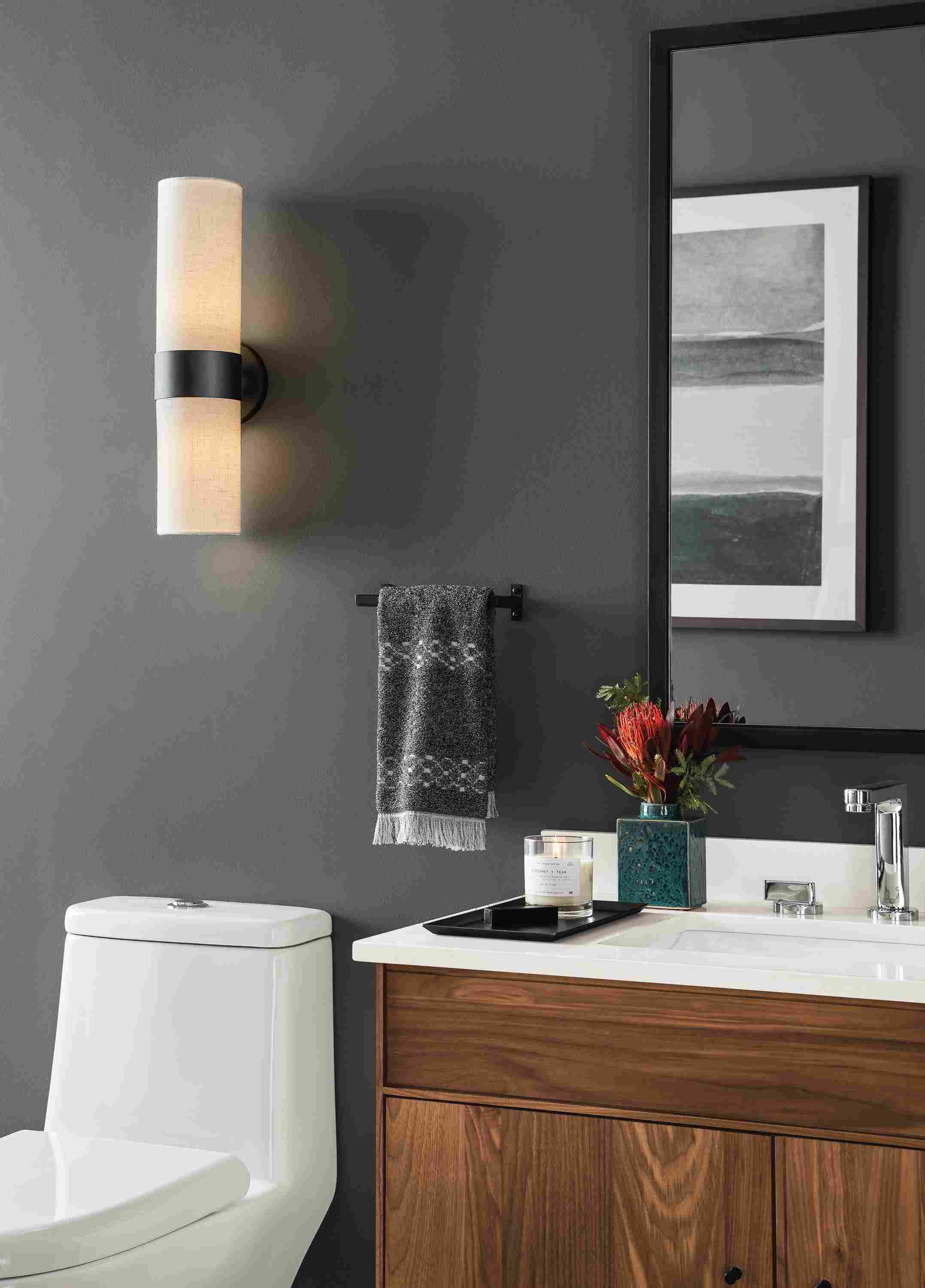 Detail of Cedric wall sconce over toilet.