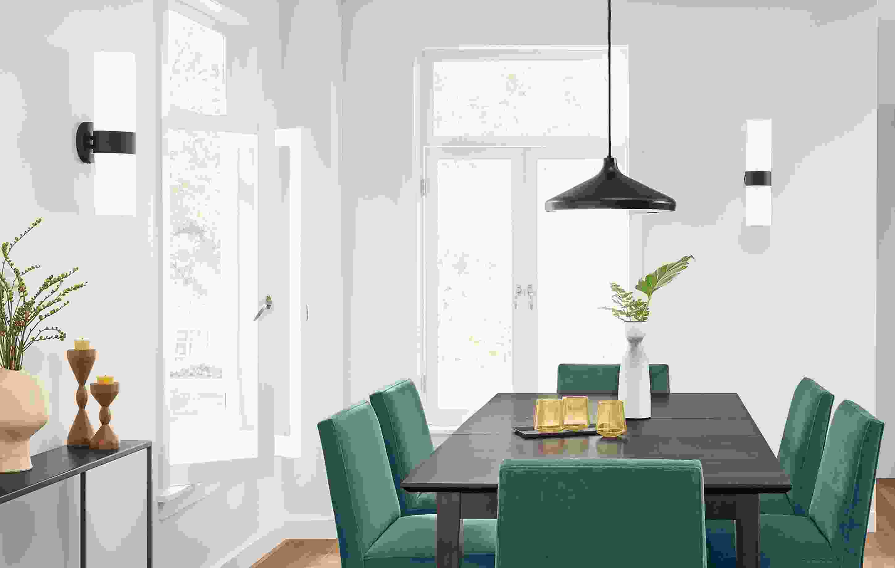 Dining room setting with Cedric wall sconces.