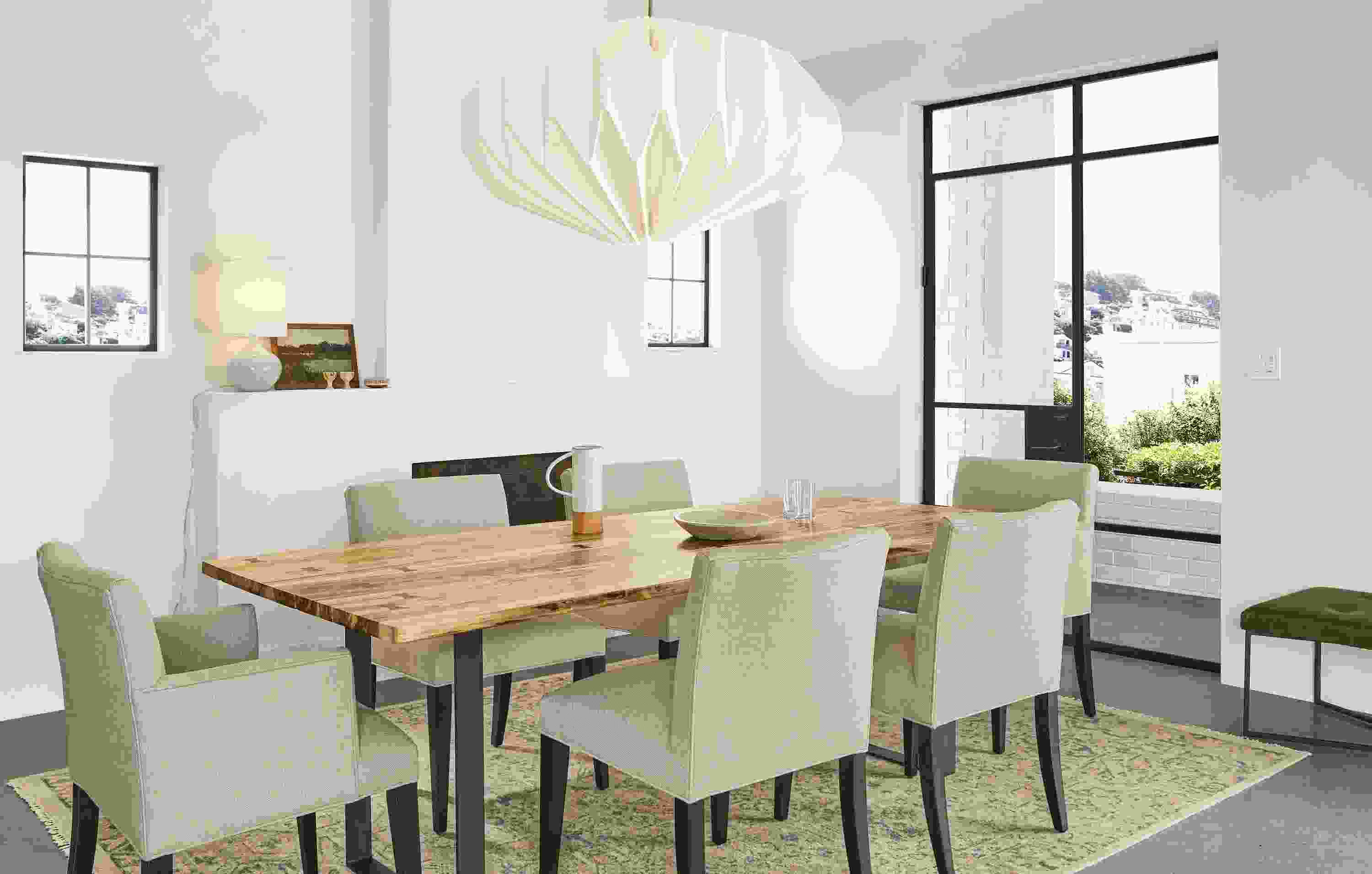 Detail of Chilton table in spalted sugarberry with natural steel base with Anjora rug.