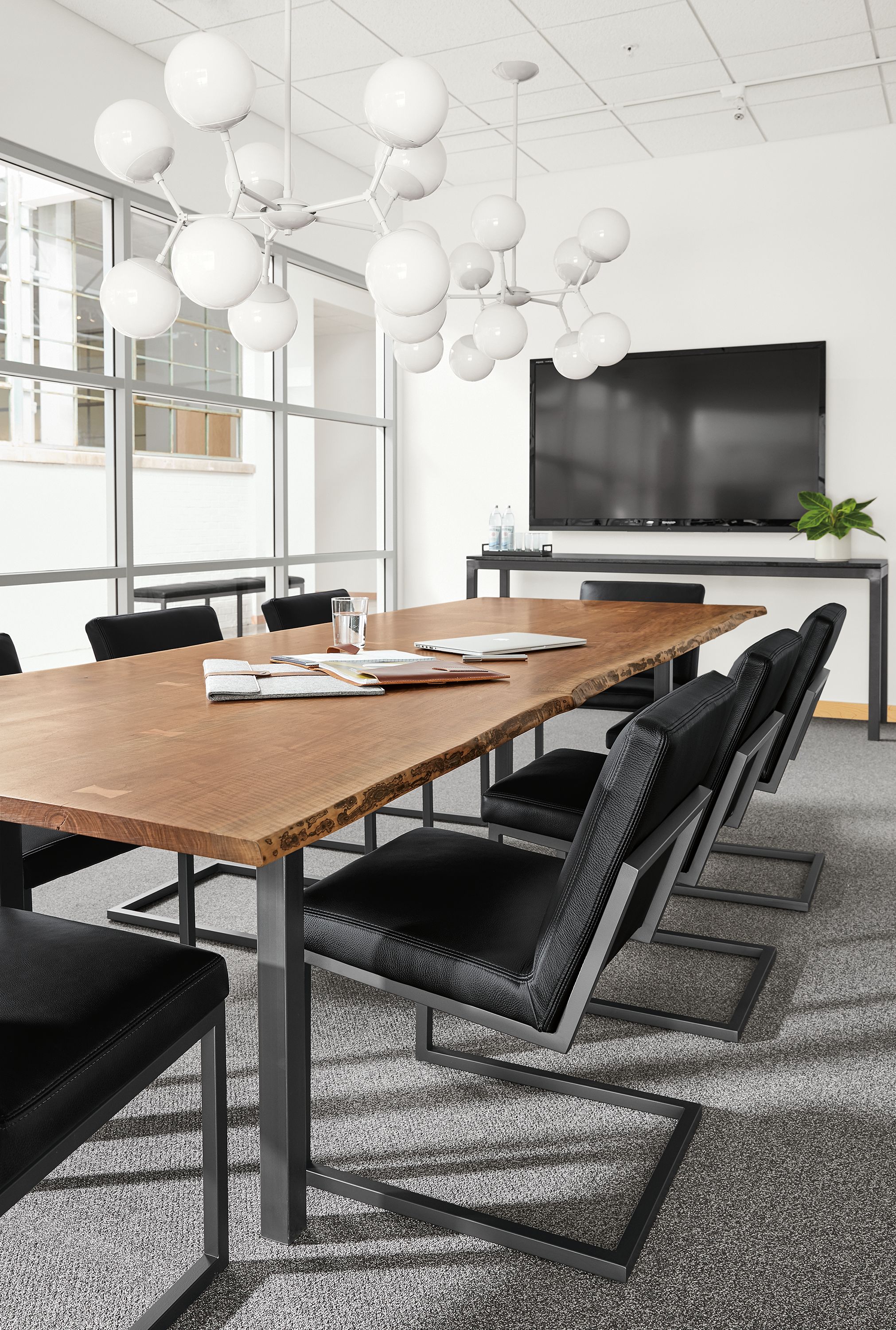 Detail of Chilton table in walnut in conference room.