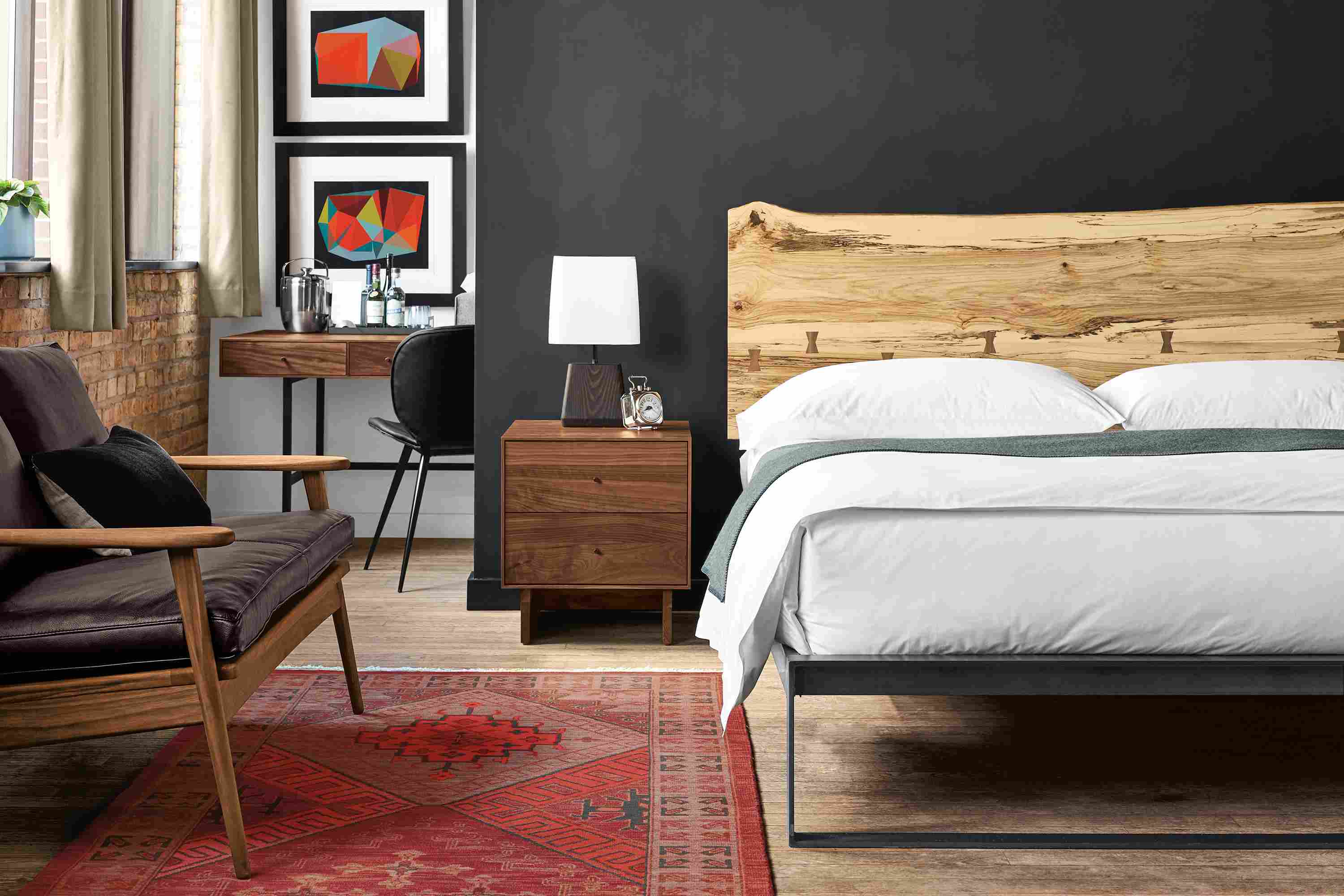Detail of Chilton king bed in spalted sugarberry in bedroom setting.