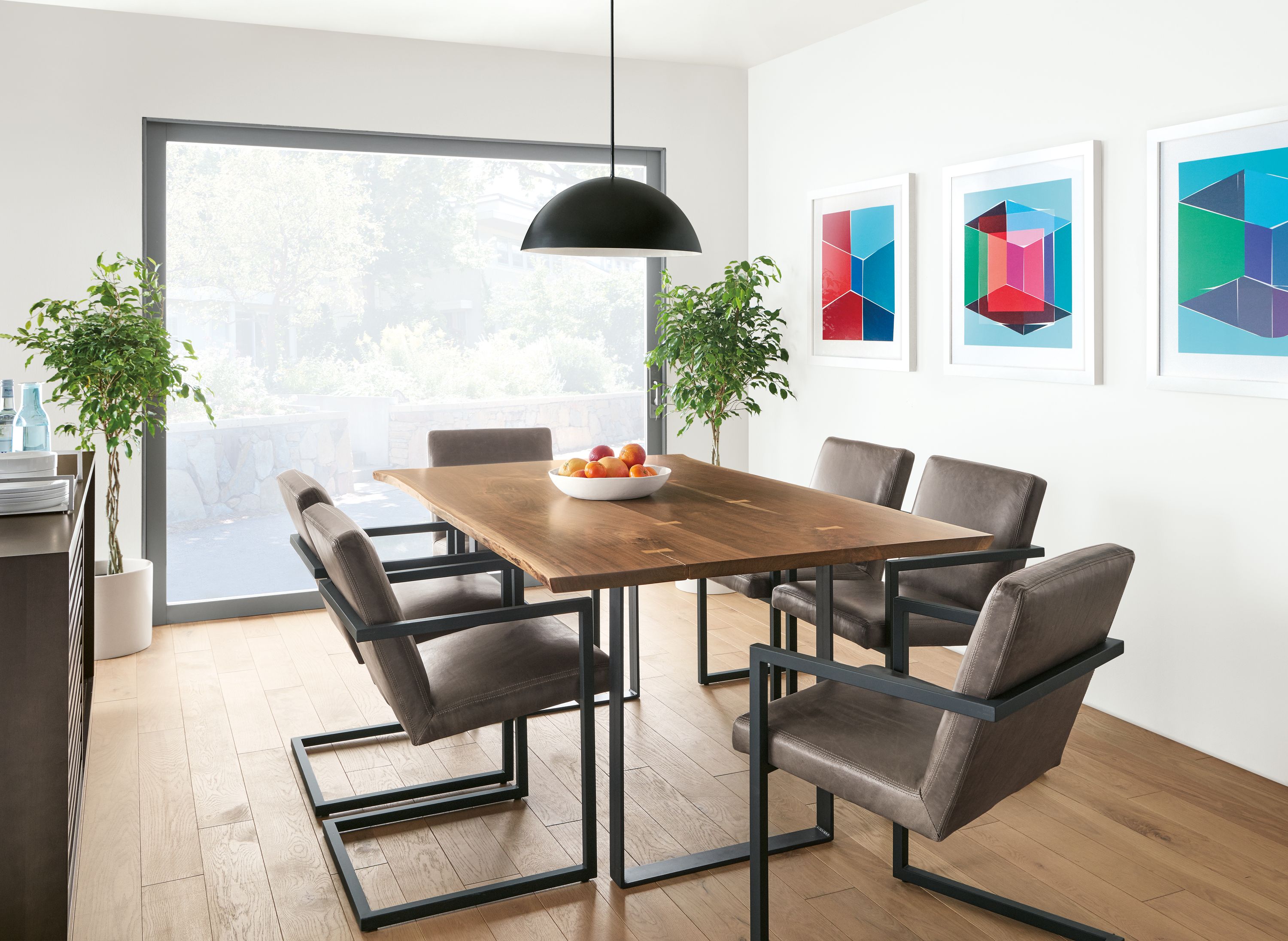 Chilton walnut dining table in modern dining room.