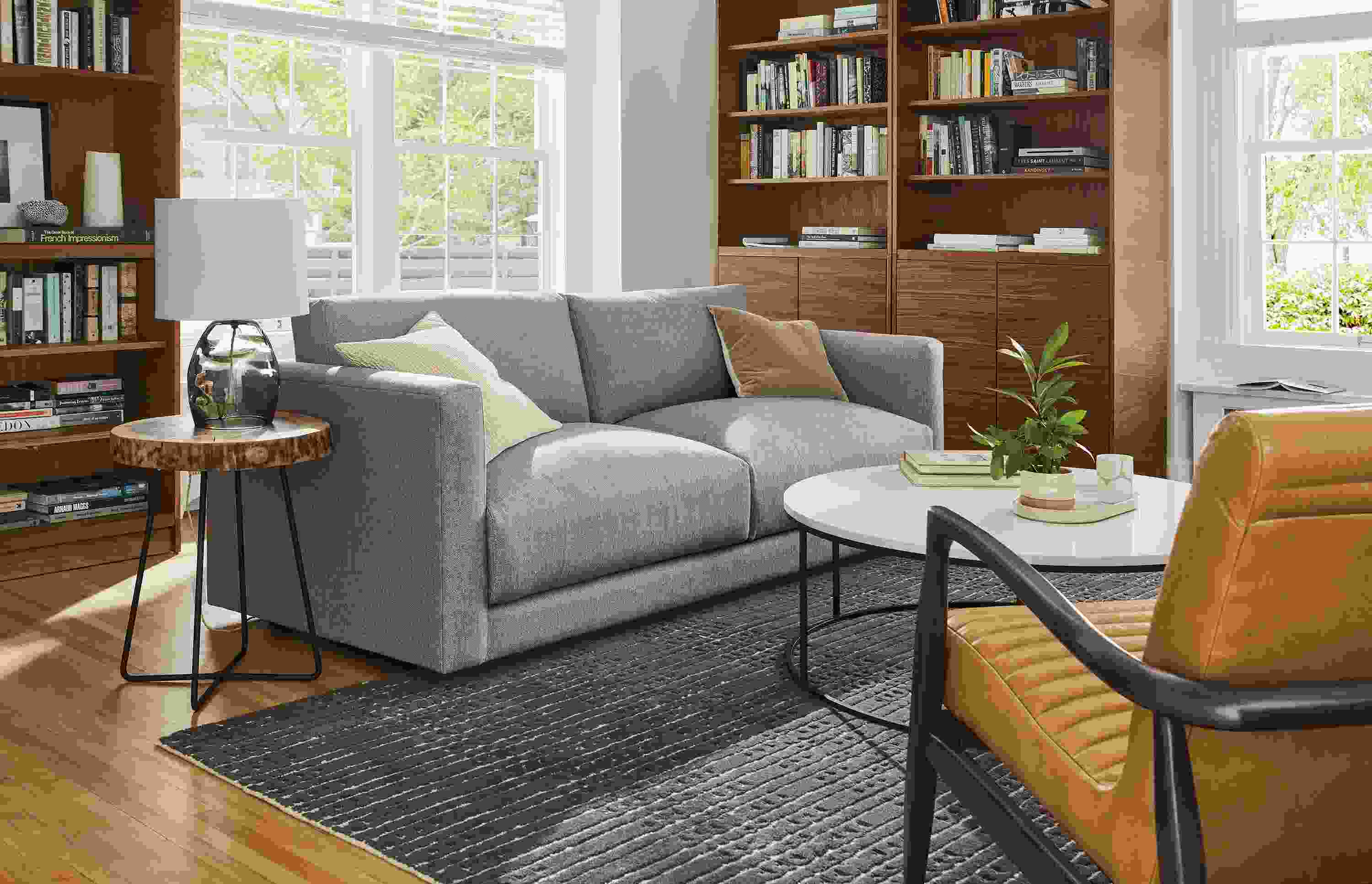 Living room with Clemens sofa in Hines fabric, Bria rug, Callan chair.