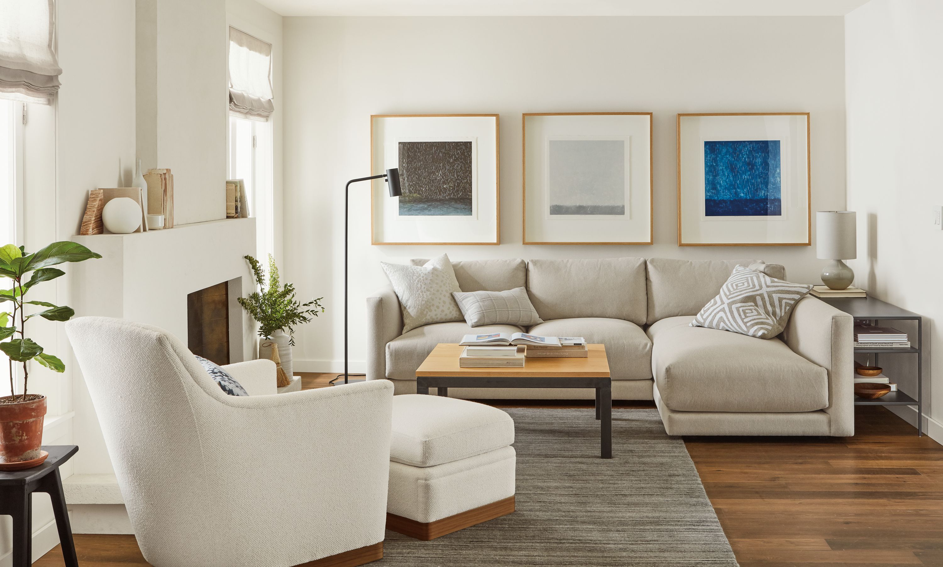 Detail of Clemens sofa with chaise in flint fabric in living room with Markus chair.